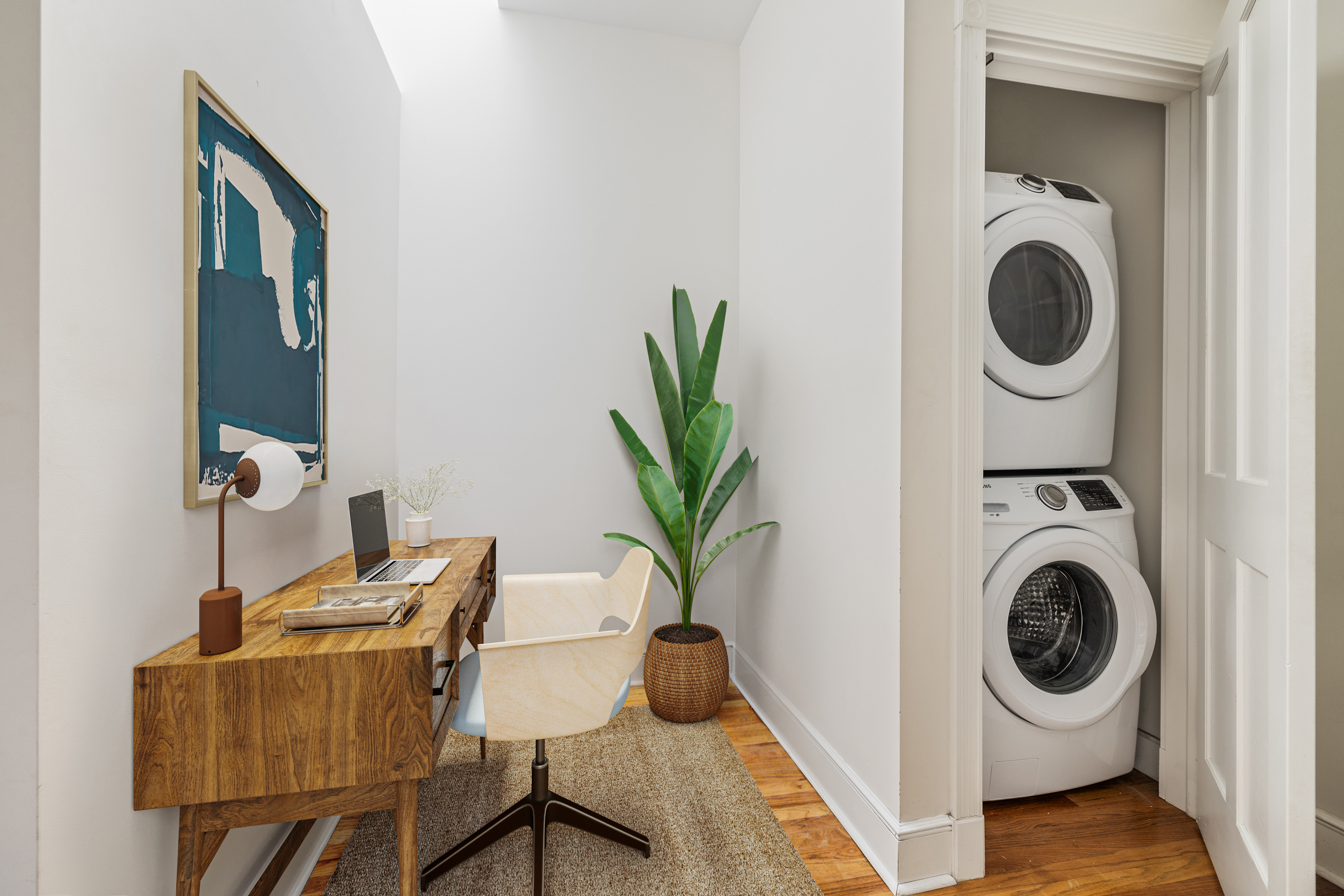 285 Weirfield Street Brooklyn, NY 11221 - Photo 5 of 16 a view of a hallway with washer and dryer