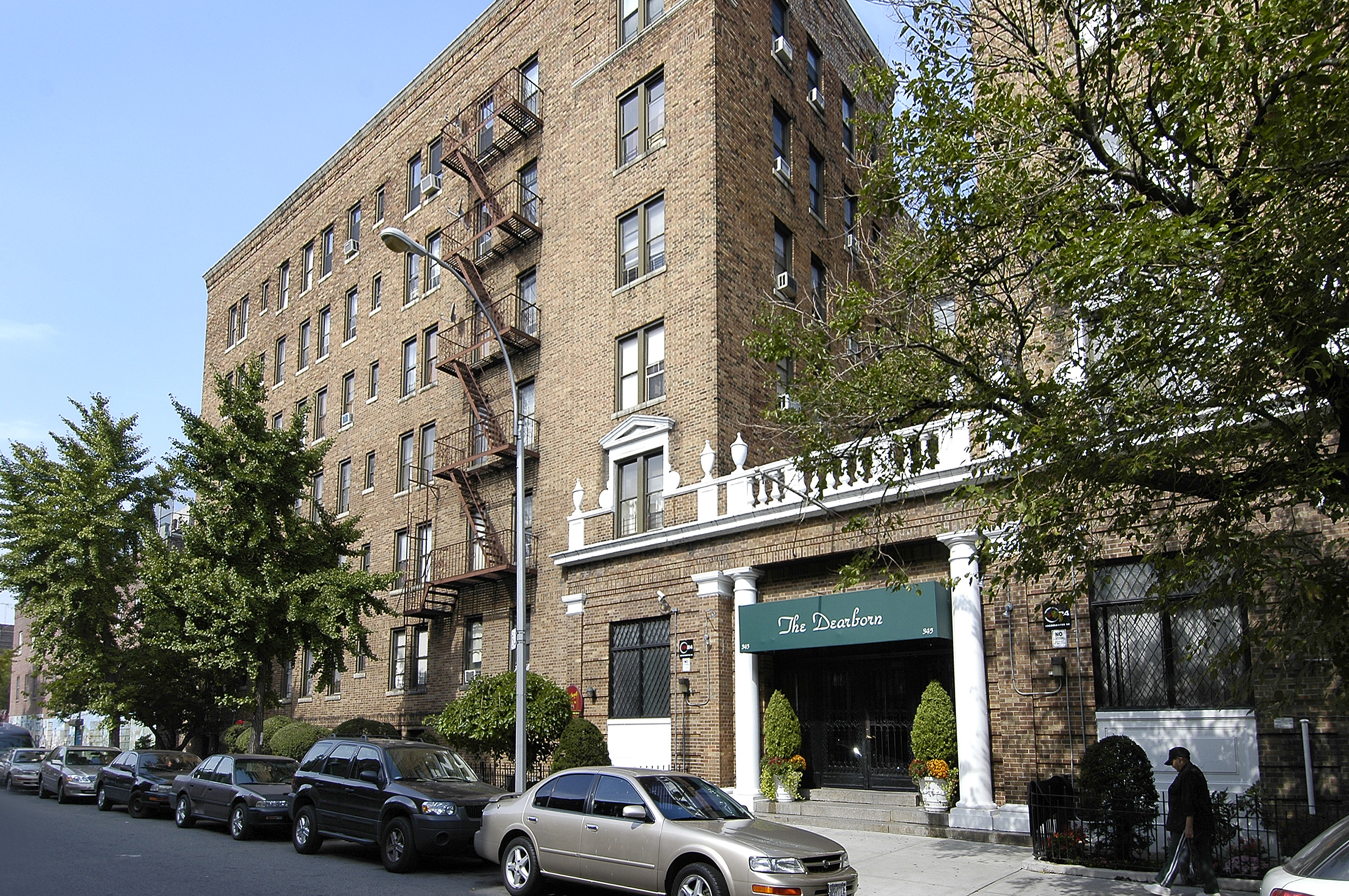 345 Montgomery Street, Unit 3C Brooklyn, NY 11225 - Photo 16 of 17 a view of a building with car parked