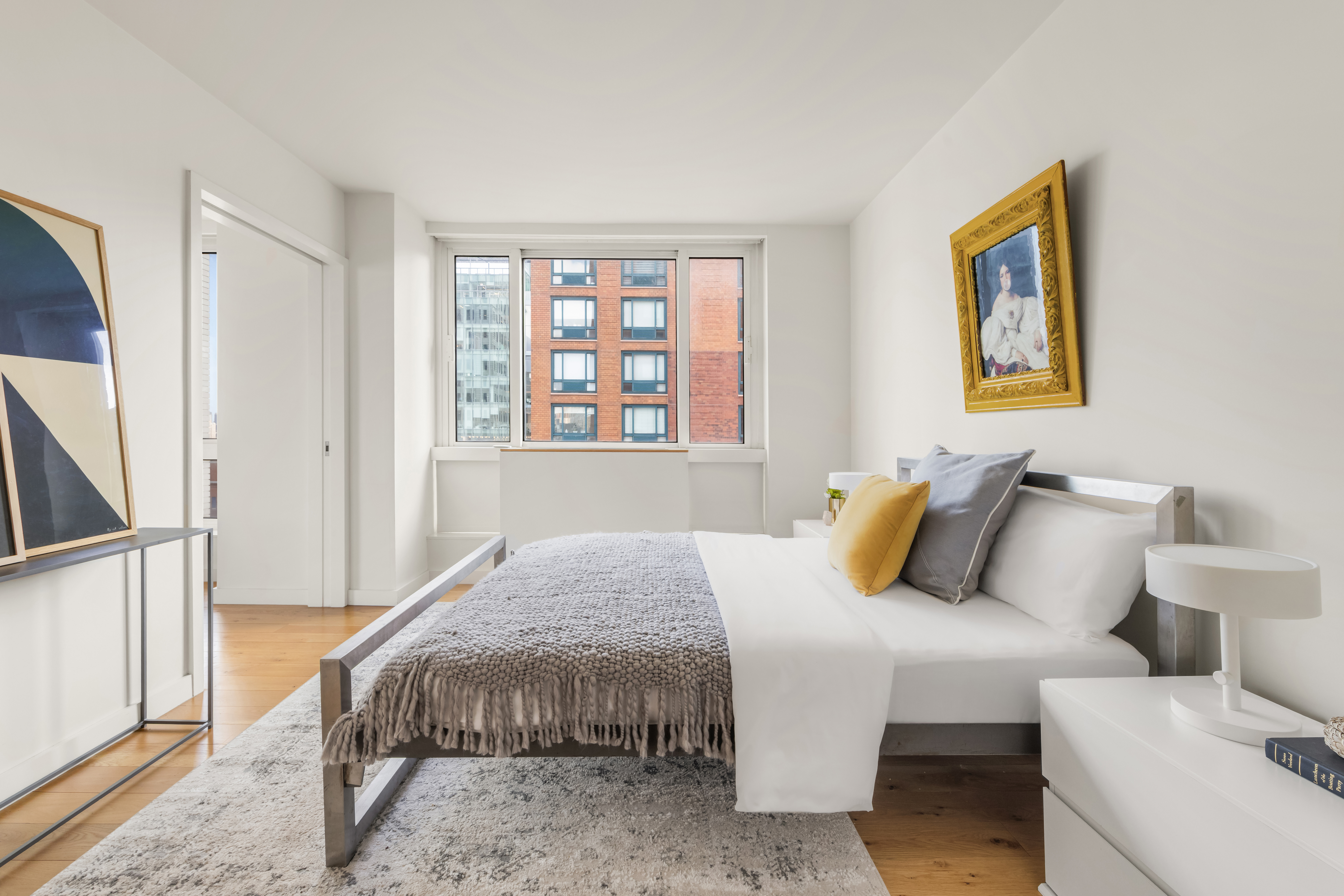 1 Irving Place, Unit G20A Manhattan, NY 10003 - Photo 6 of 14 a bedroom with a bed and a window
