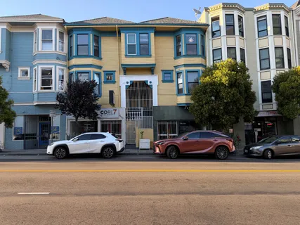 a cars parked in front of a building