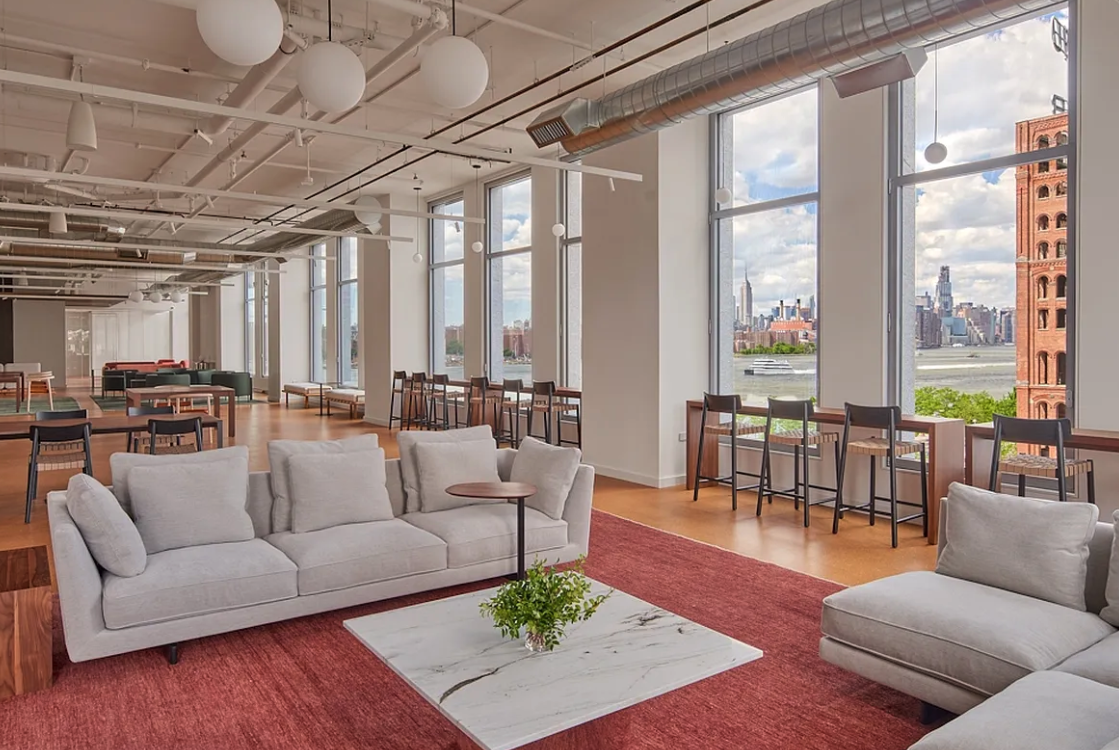5 South 5th Street, Unit 913 Brooklyn, NY 11249 - Photo 21 of 24 a living room with furniture and a large window