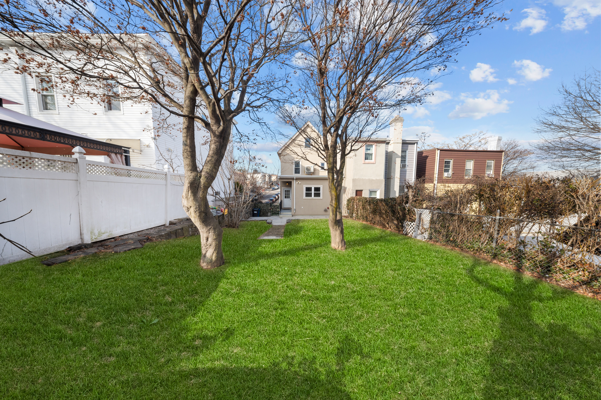 52-19 69th Street Queens, NY 11378 - Photo 29 of 35 a house view with backyard space