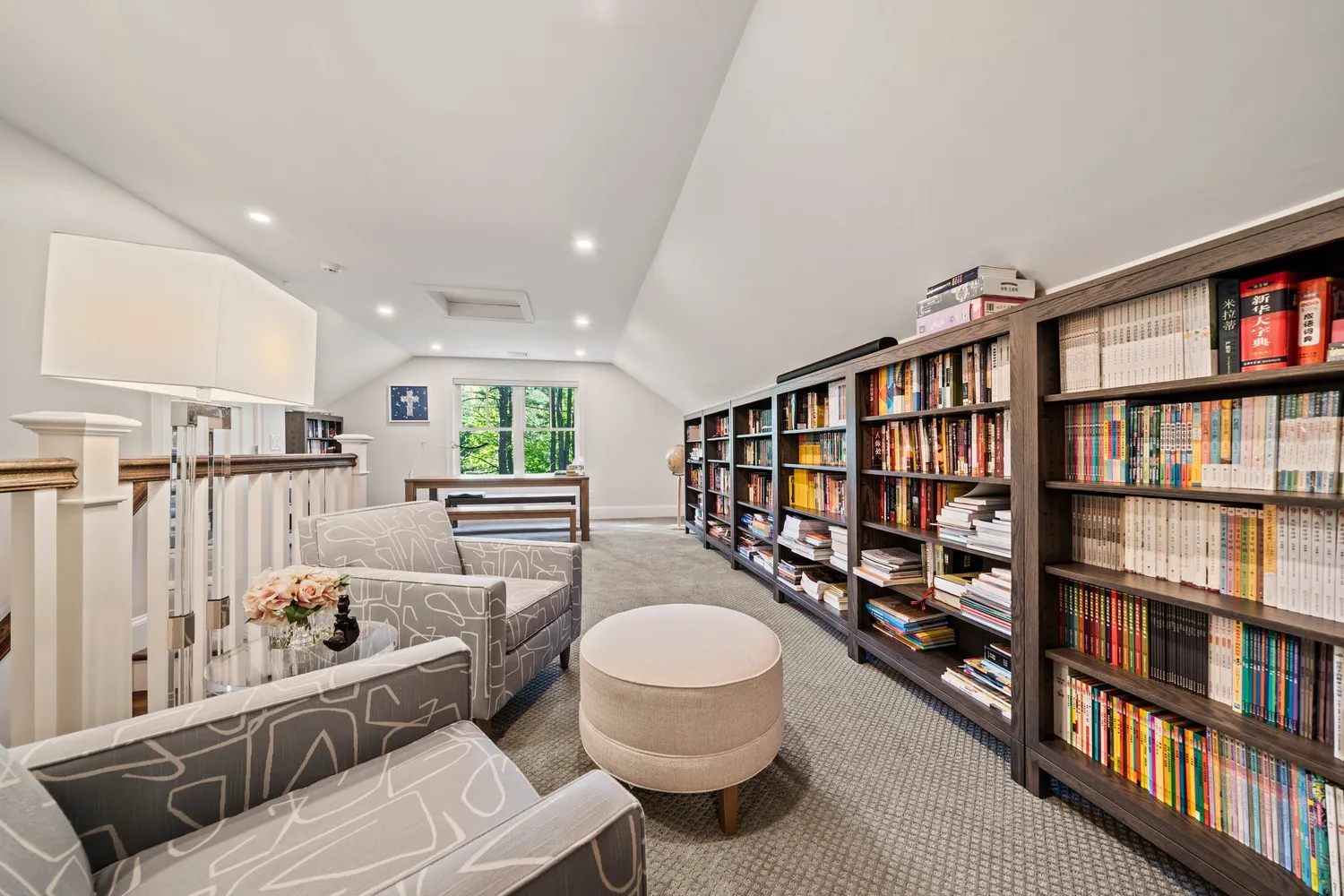 an aerial view of residential house with outdoor space and trees all around