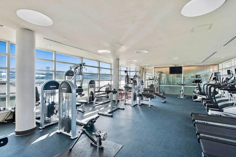 2 Northside Piers, Unit 26C Brooklyn, NY 11249 - Photo 16 of 21 a view of a room with gym equipment