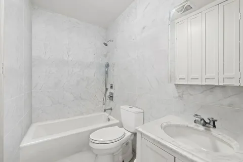 a front view of a building with glass windows