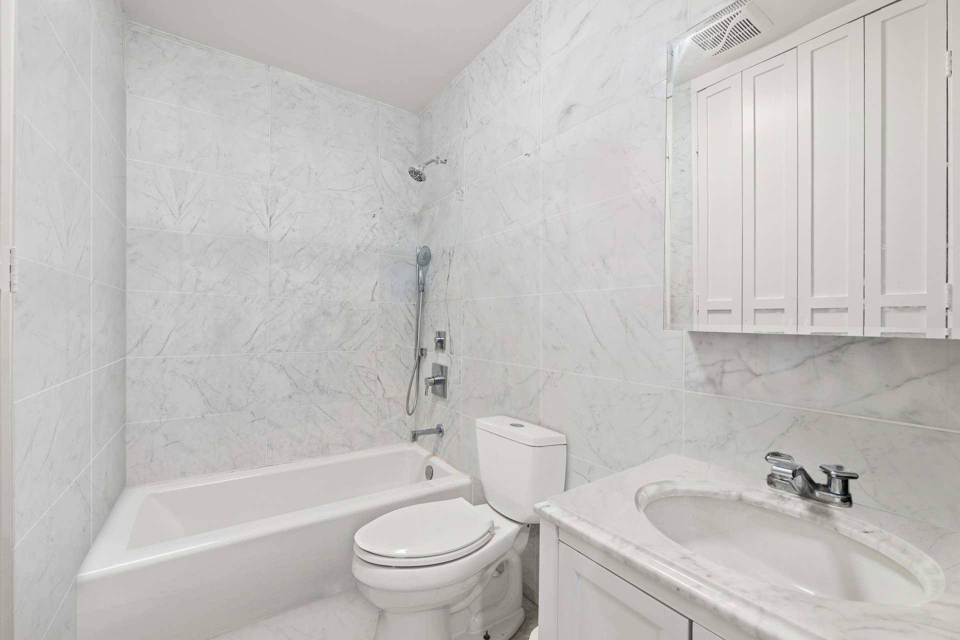 99 Spring Street, Unit PH Manhattan, NY 10012 - Photo 20 of 23 a bathroom with a sink toilet and bathtub