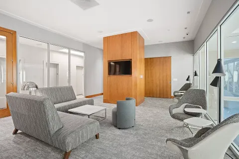 a room with furniture and a flat screen tv