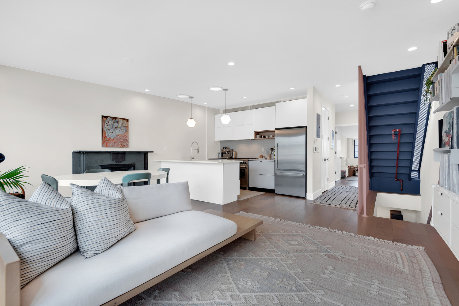 541 Madison Street, Unit 4 Brooklyn, NY 11221 - Photo 5 of 9 a living room with furniture and kitchen view
