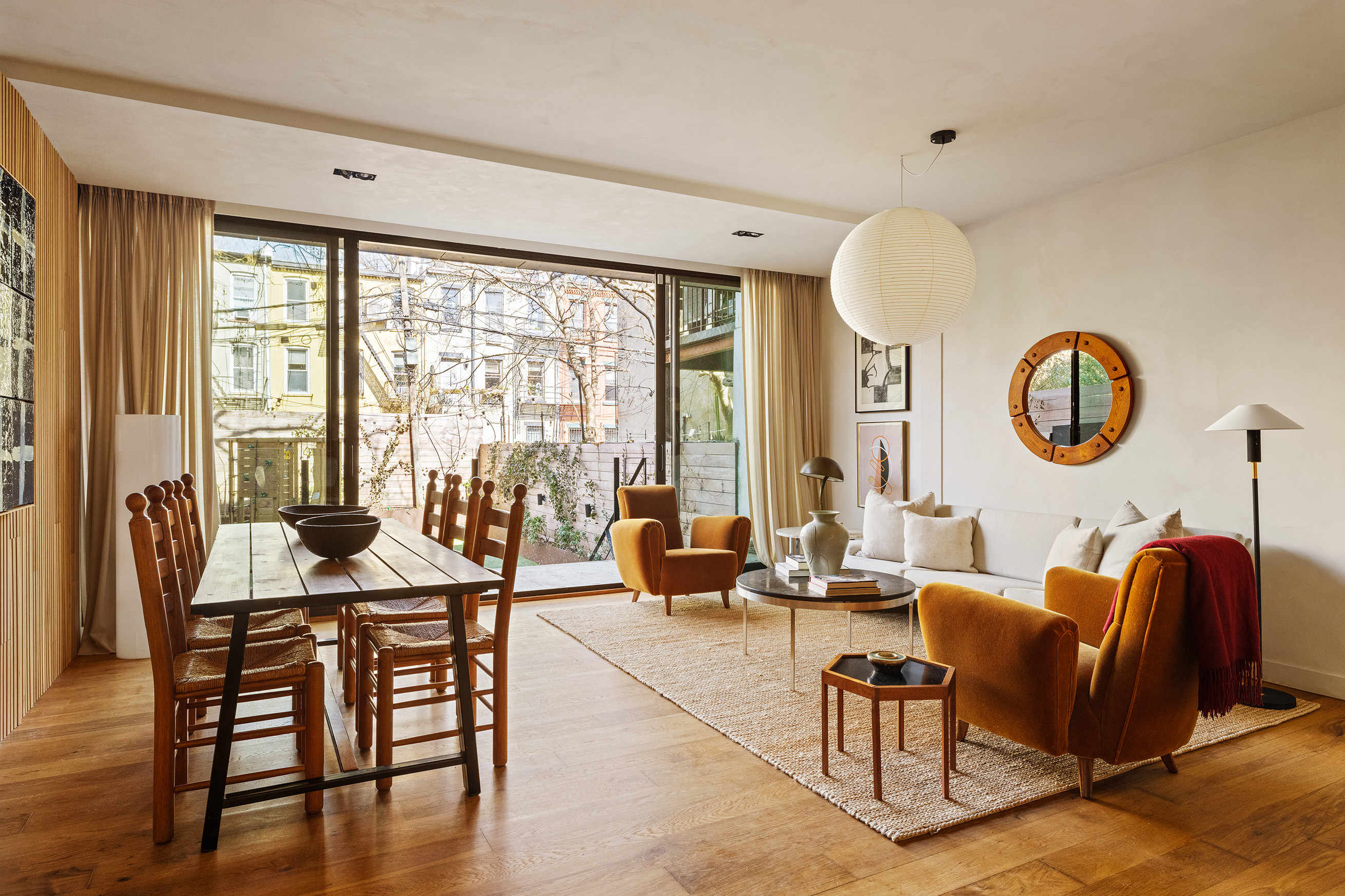 101 Douglass Street, Unit 1 Brooklyn, NY 11231 - Photo 2 of 21 a living room with furniture and a large window