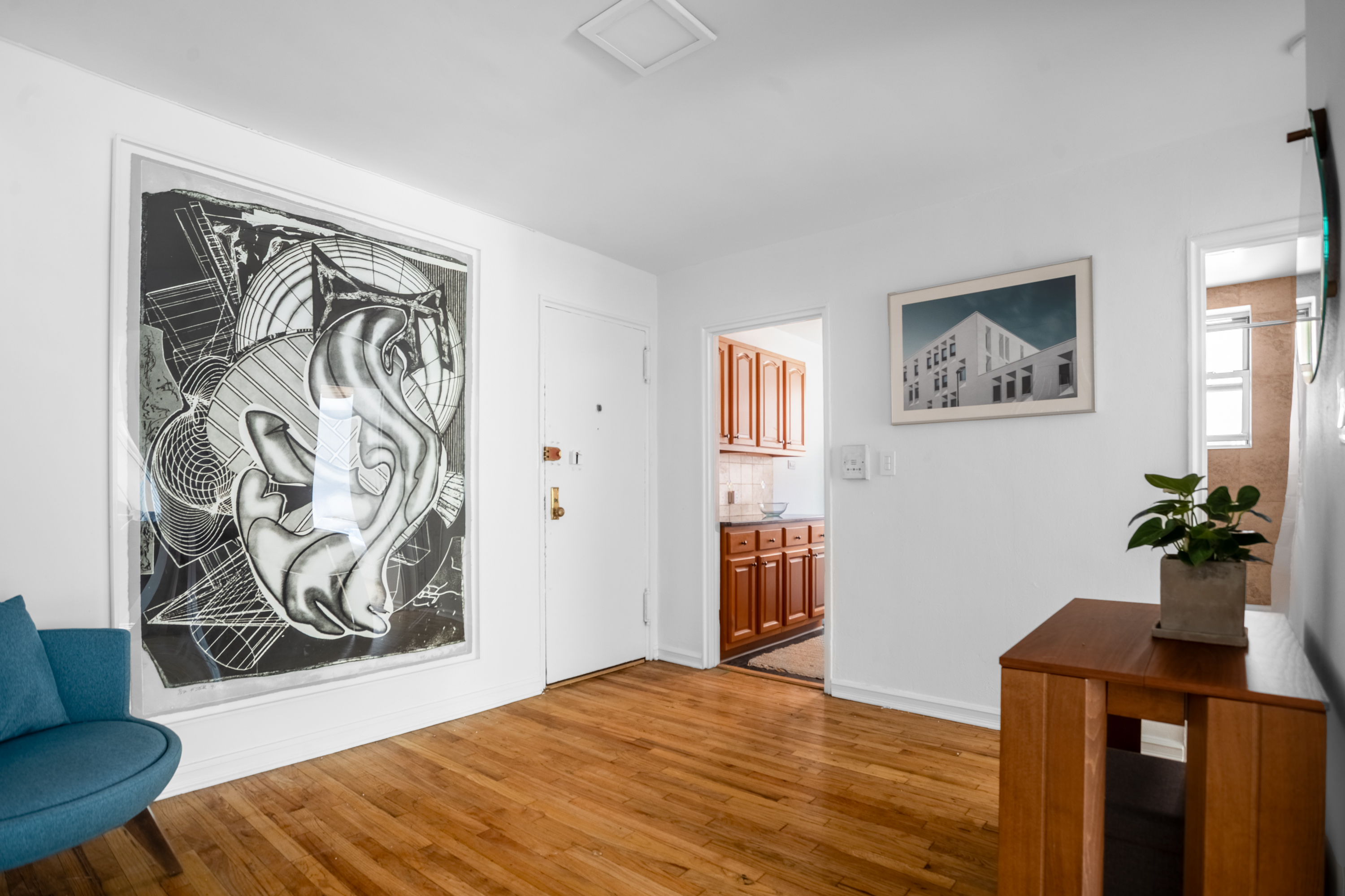 340 Haven Avenue, Unit 2H Manhattan, NY 10033 - Photo 6 of 24 a bedroom with a bed and wooden floor