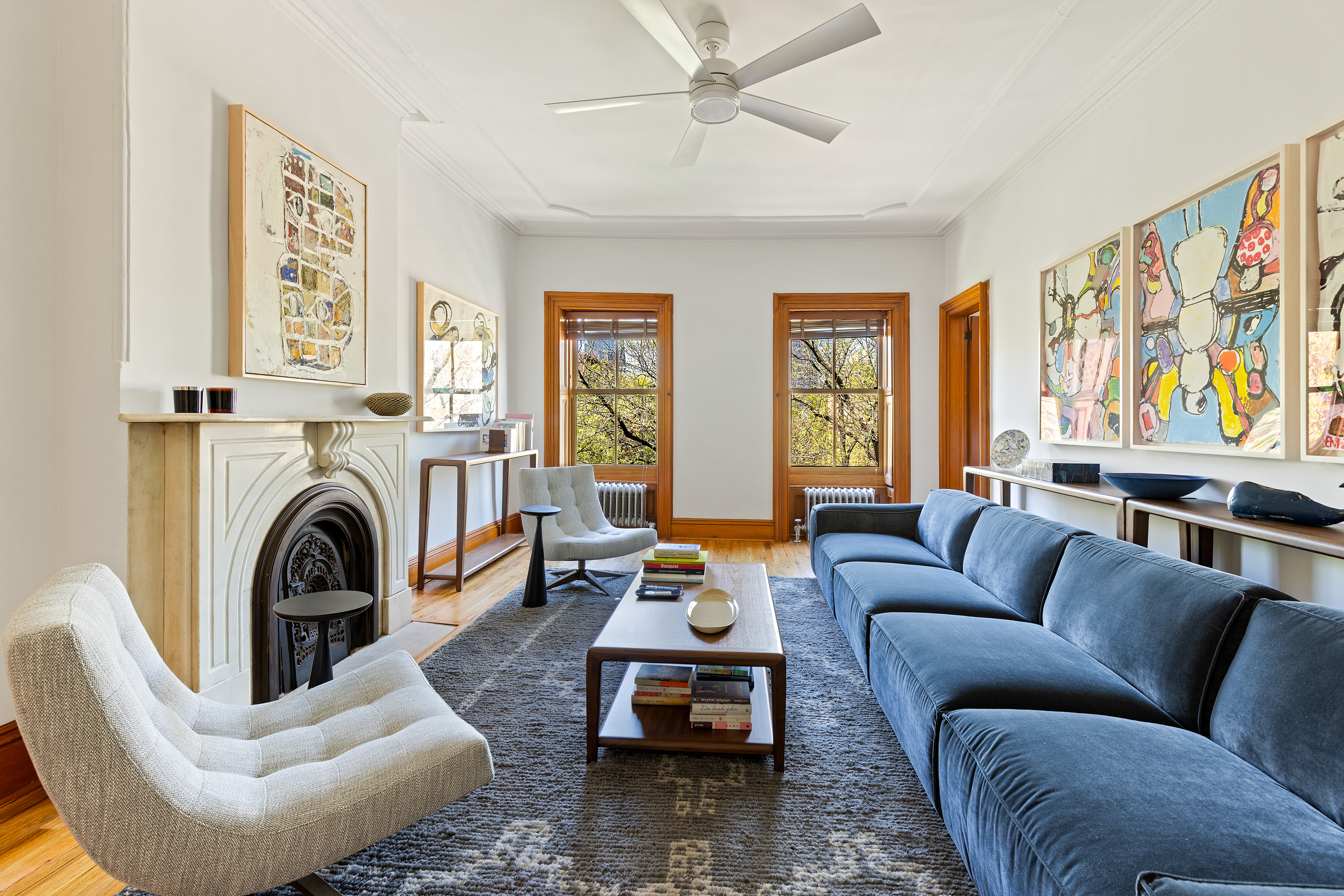 315 Adelphi Street Brooklyn, NY 11205 - Photo 25 of 31 a living room with furniture a couch and a large window