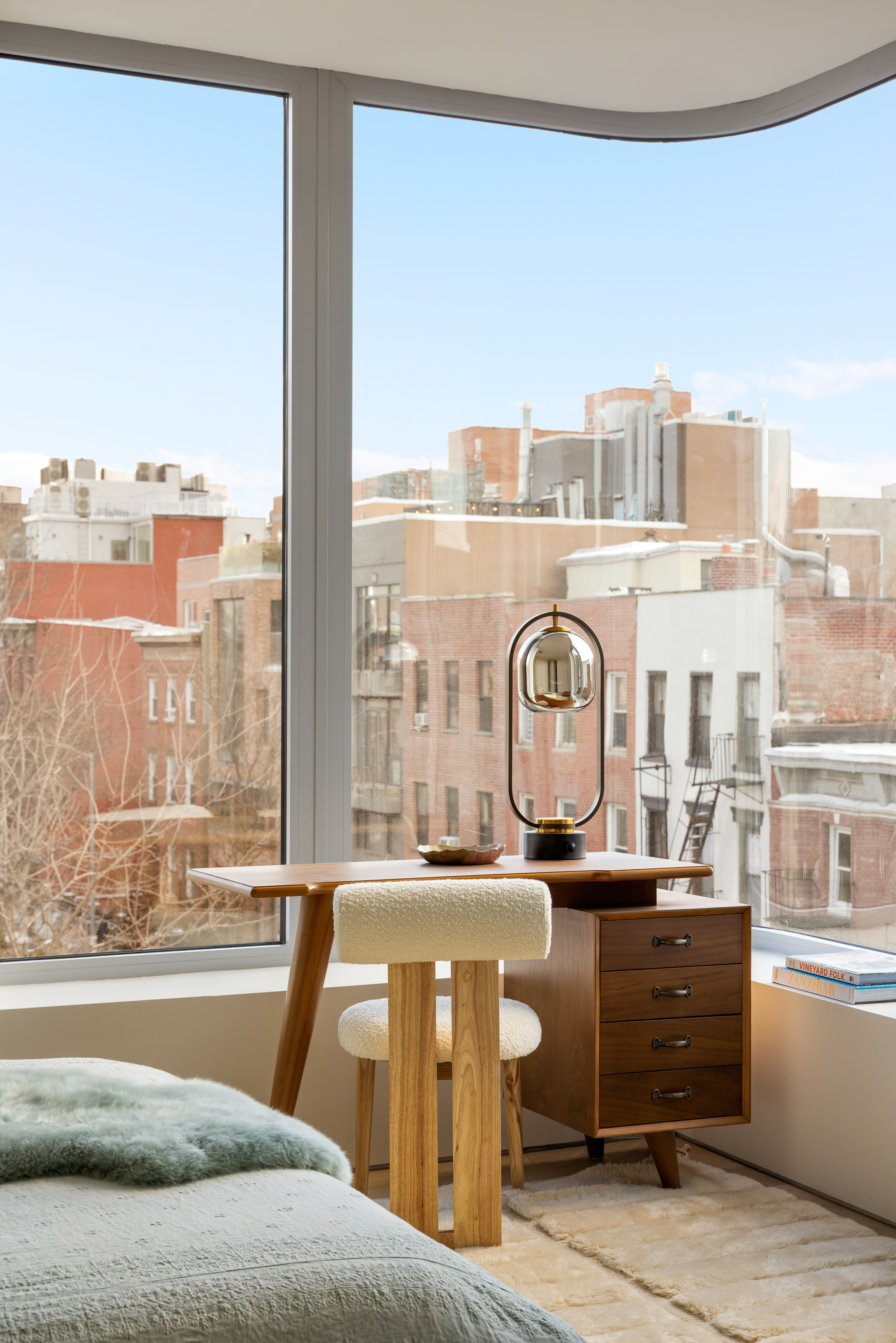 276 Berry Street Brooklyn, NY 11249 - Photo 24 of 36 a living room with furniture and a floor to ceiling window