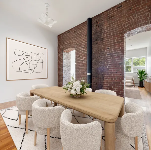 a dining room with furniture and window