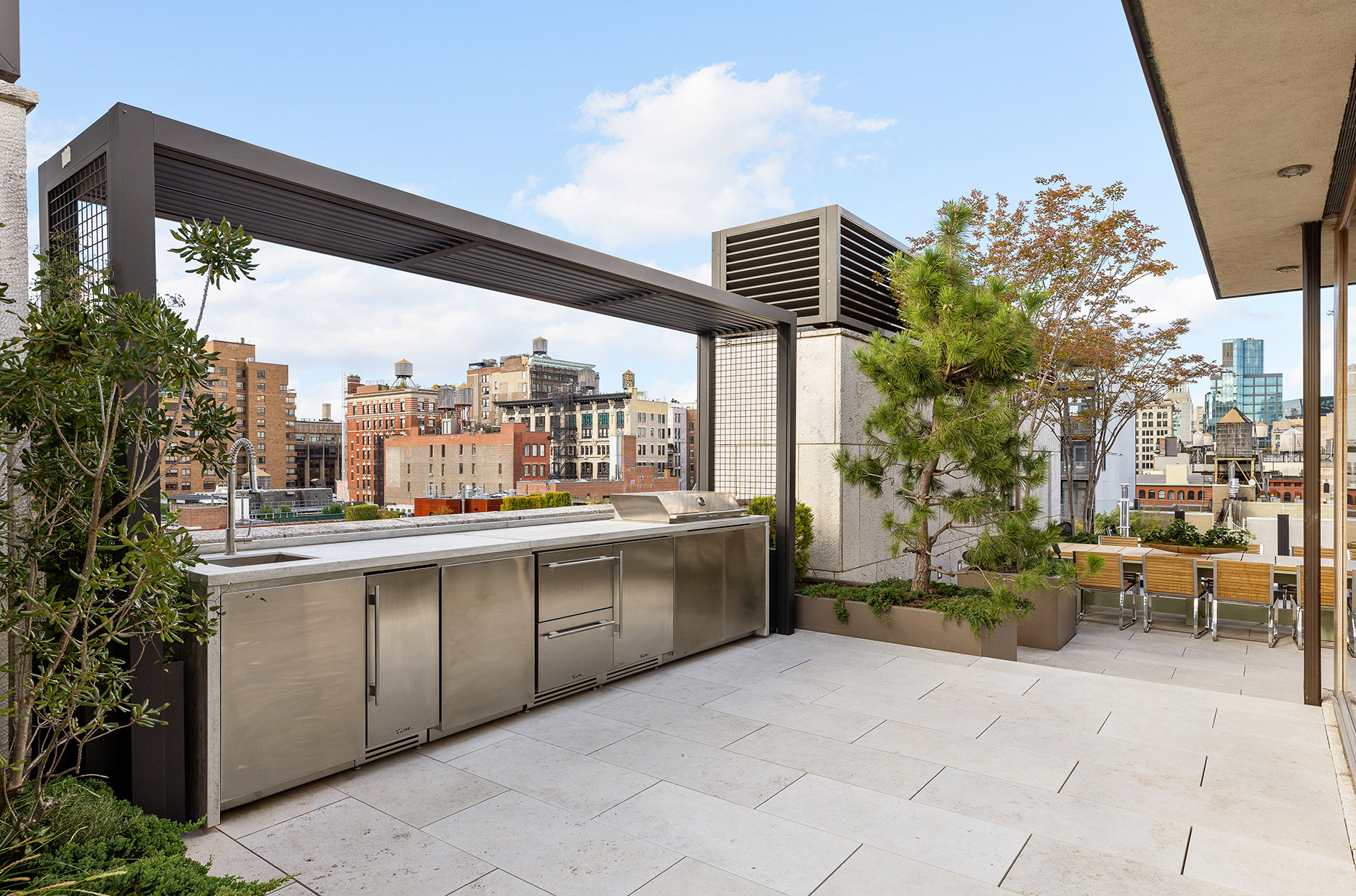 25 Bond Street, Unit PHW Manhattan, NY 10012 - Photo 27 of 34 a large white building with a view of living room