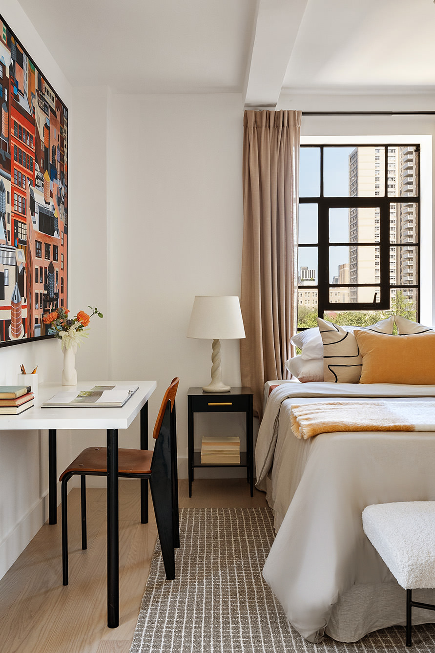 320 Central Park West, Unit 7L Manhattan, NY 10025 - Photo 11 of 16 a bed room with a bed and a table