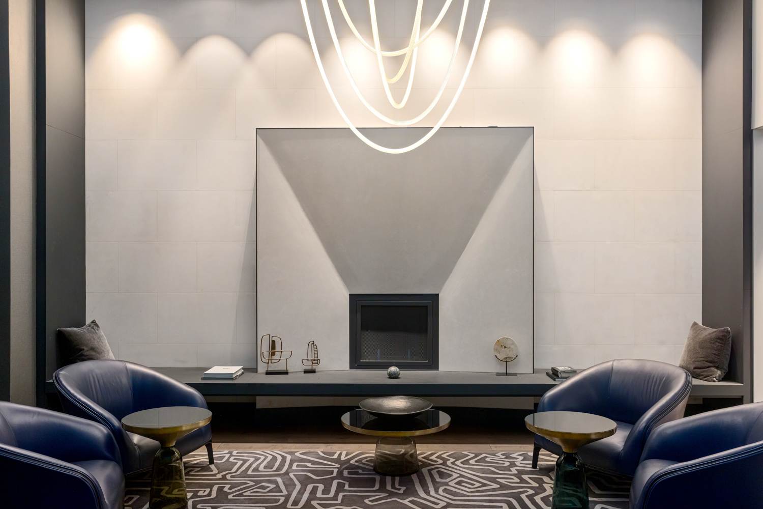 91 Leonard Street, Unit 4A Manhattan, NY 10013 - Photo 17 of 22 a living room with furniture and a fireplace