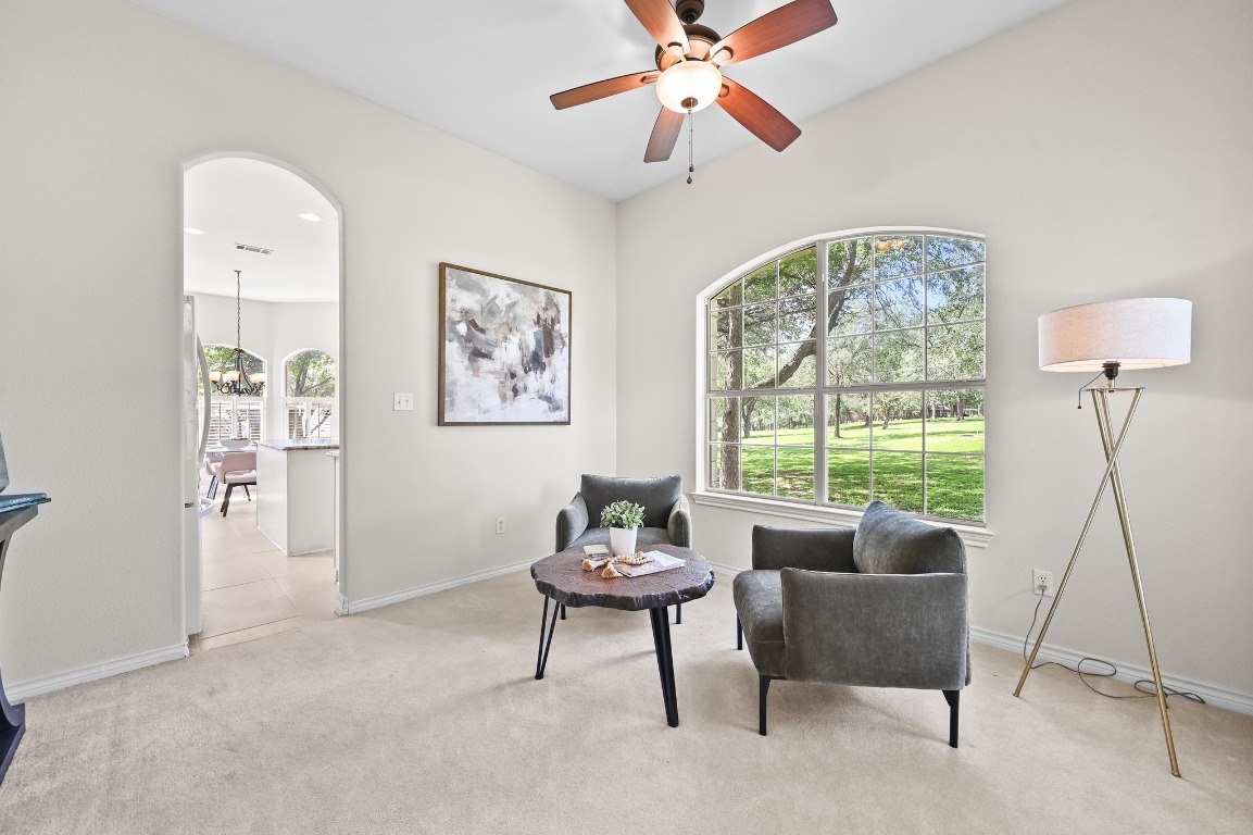 111 Trinity Street Cedar Creek, TX 78612 - Photo 4 of 38 a living room with furniture and a large window