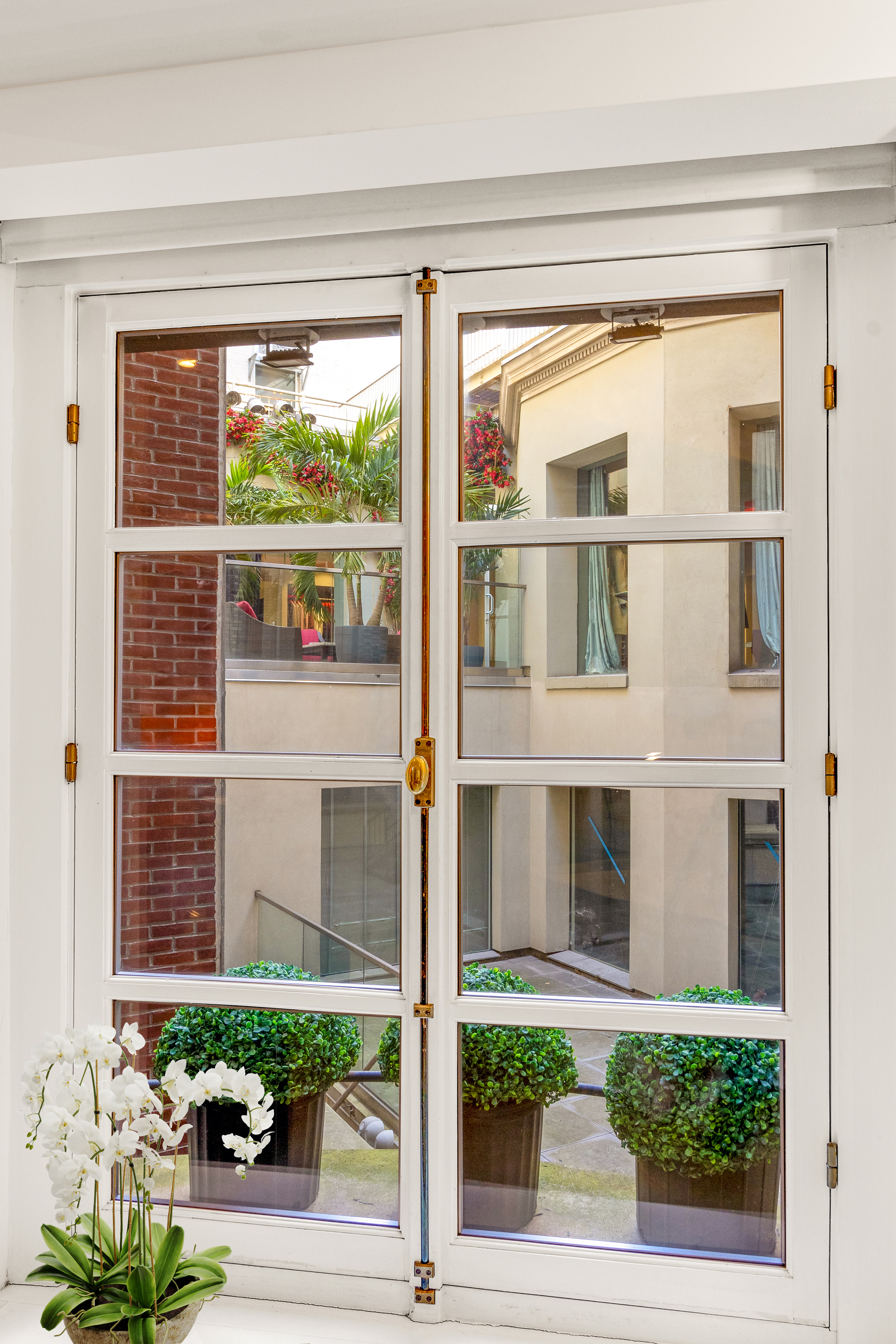 35 East 68th Street, Unit 2A Manhattan, NY 10021 - Photo 9 of 19 a view of a door and a window