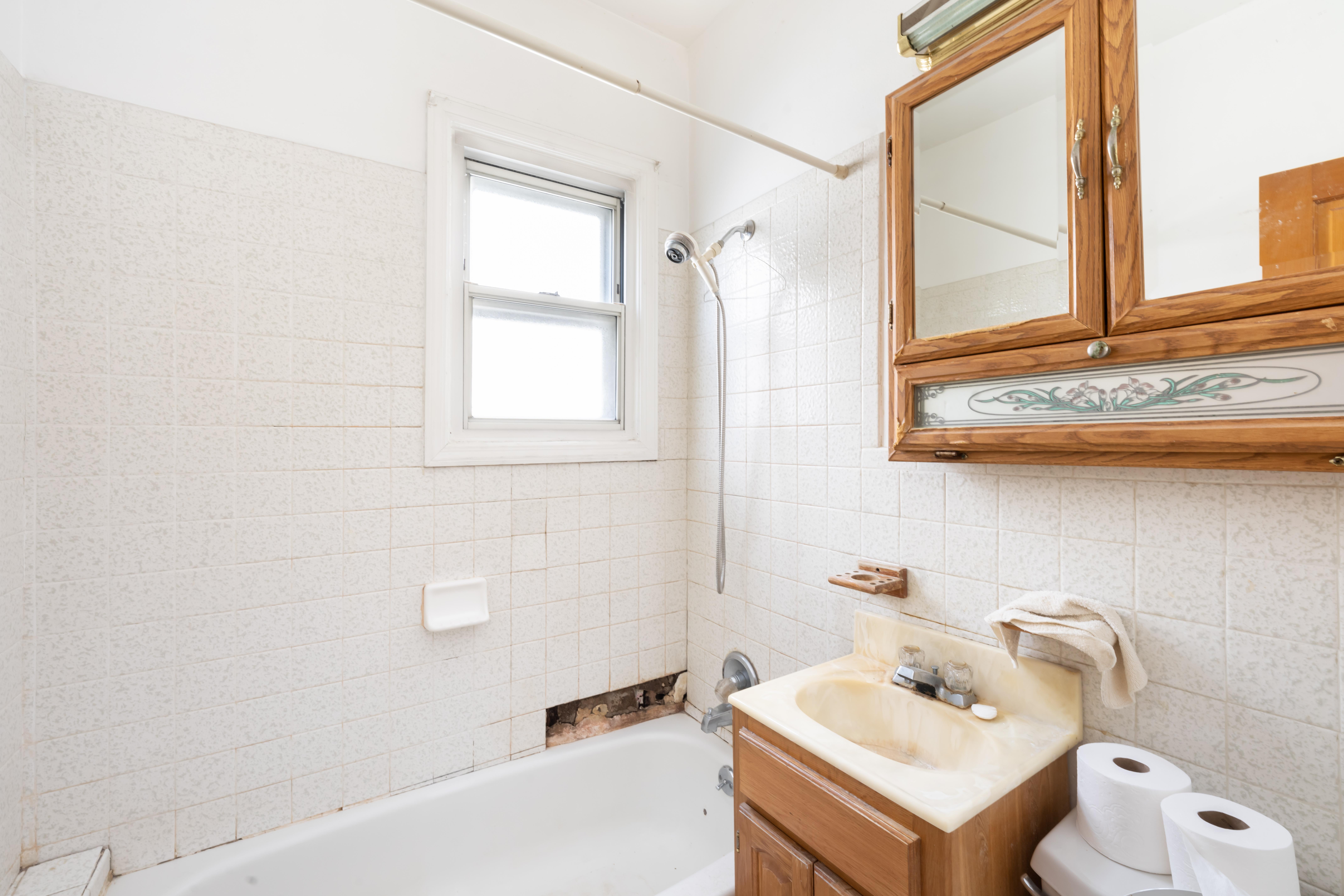 1085 Arnow Avenue Bronx, NY 10469 - Photo 8 of 16 a bathroom with a sink and a toilet
