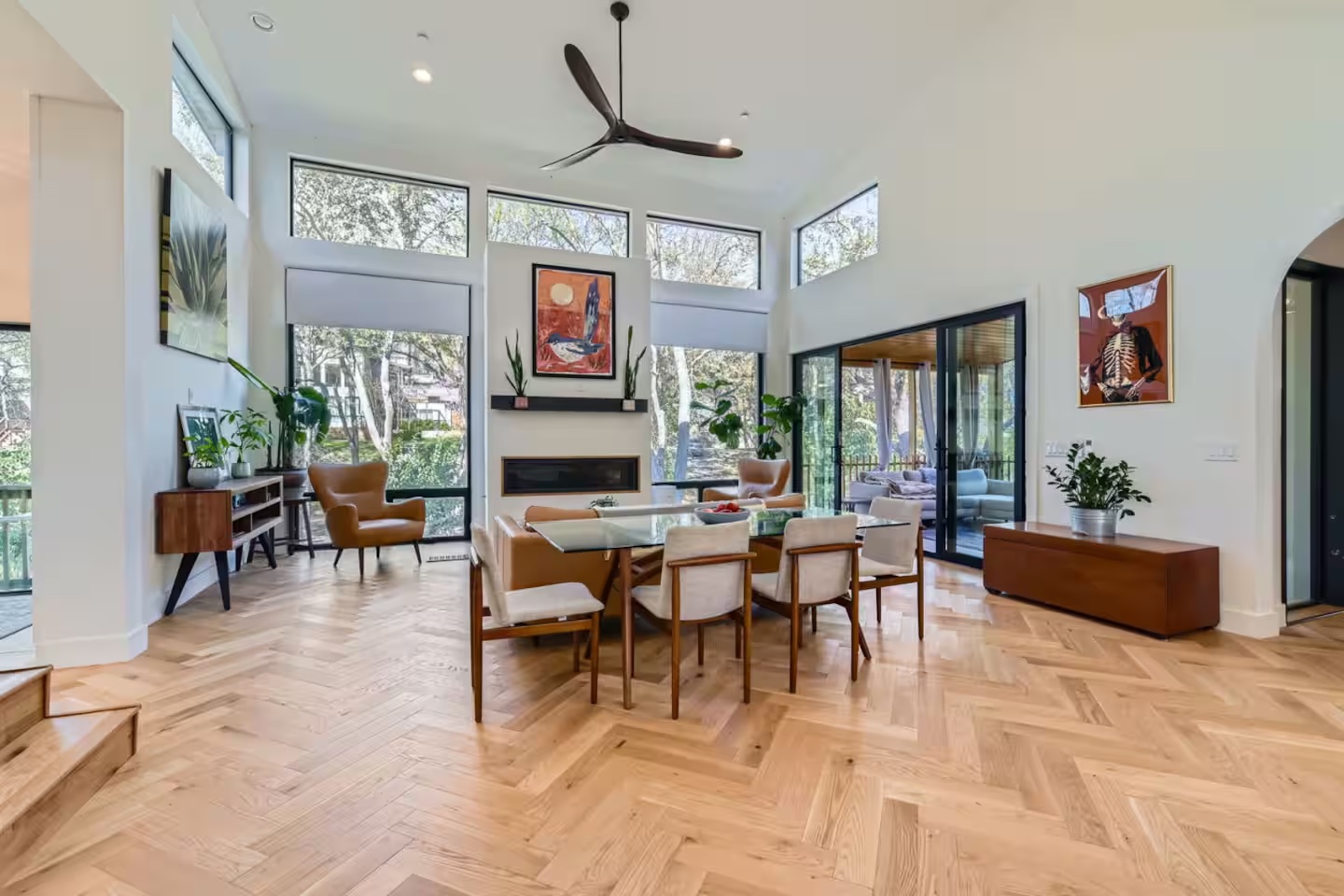 107 Blue Ridge Trail Austin, TX 78746 - Photo 2 of 38 a living room with furniture a window and a flat screen tv