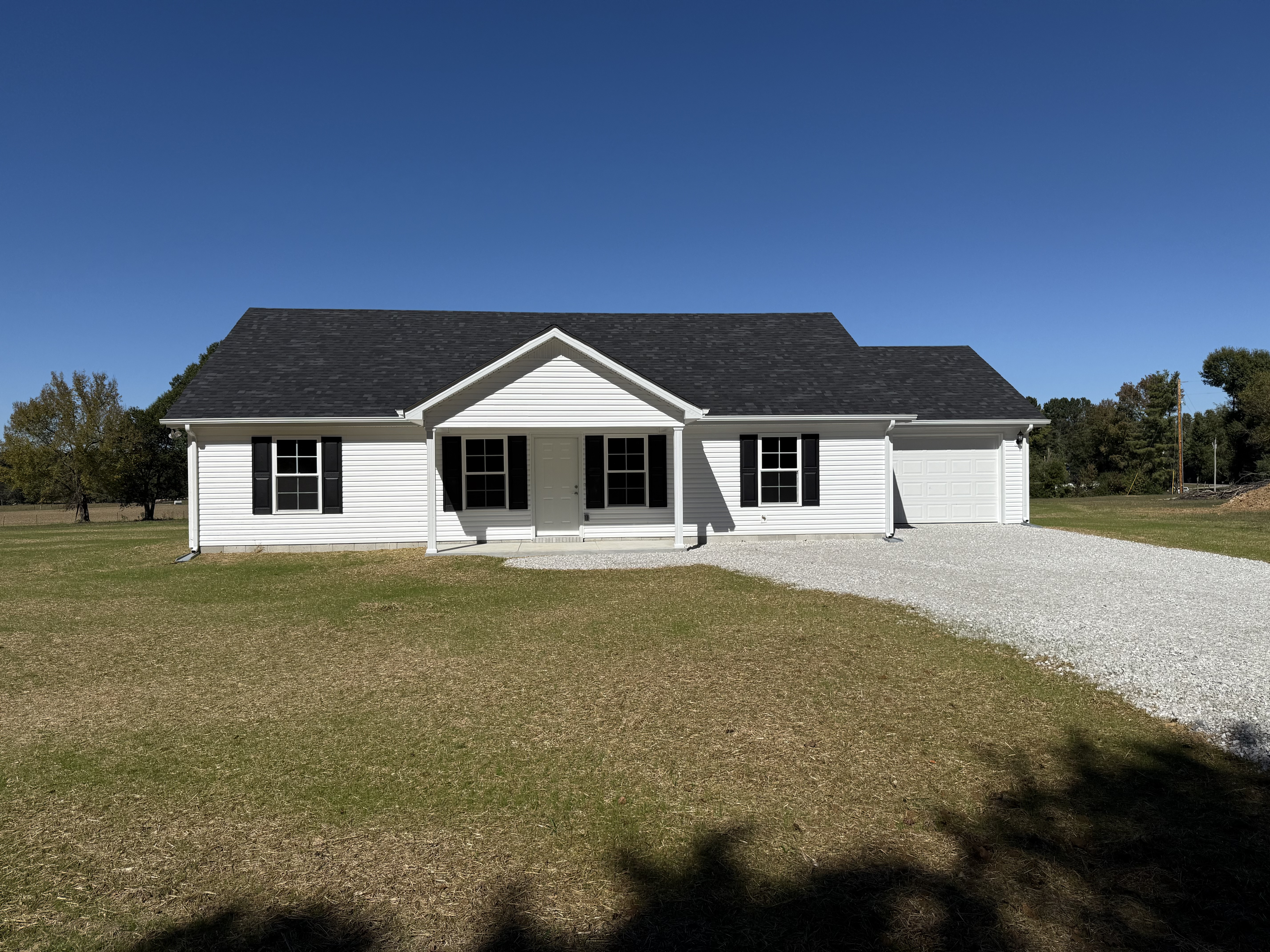 585 Paynes Church Road Estill Springs, TN 37330 - Photo 1 of 34 a front view of a house with a yard