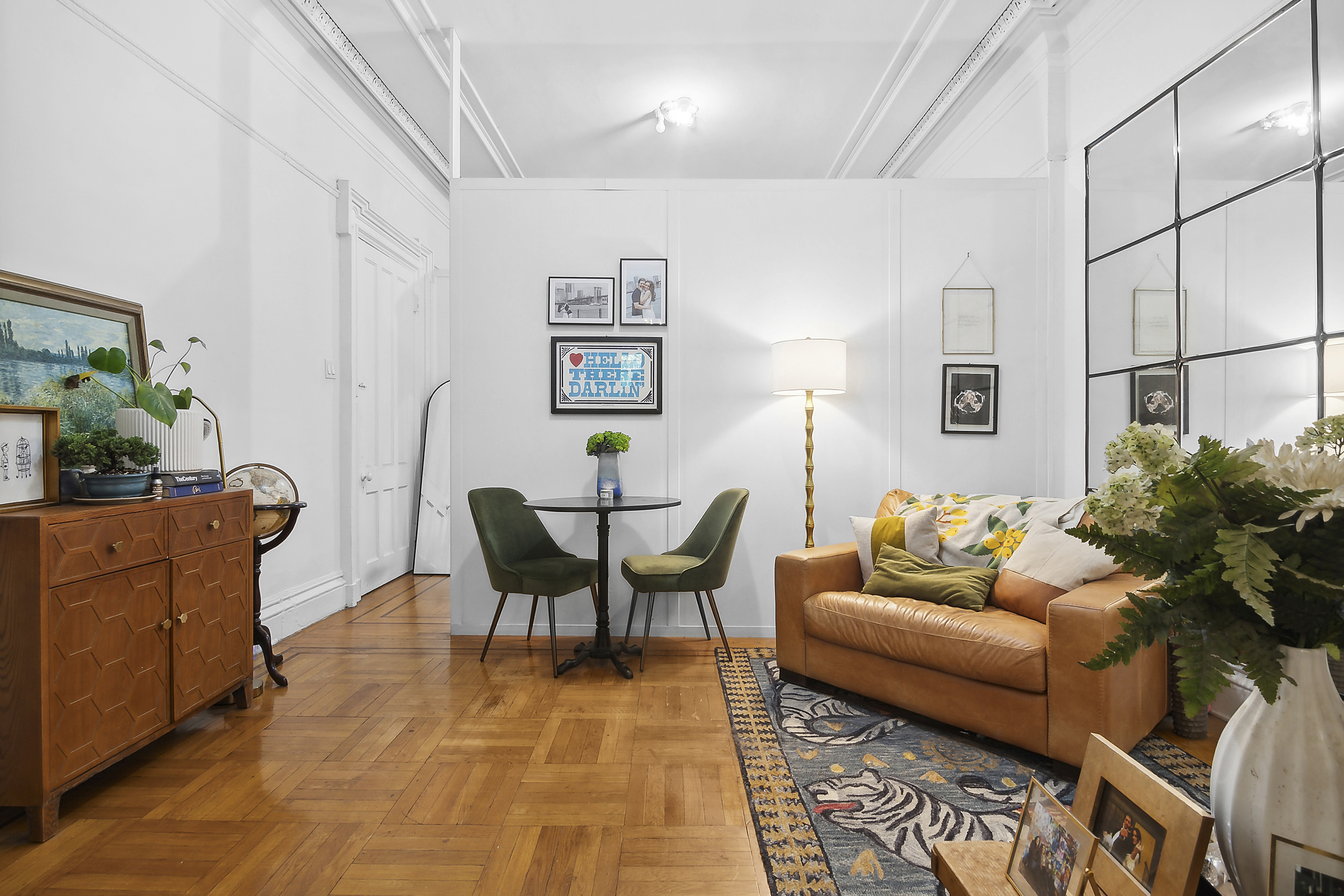 245 Baltic Street, Unit 1 Brooklyn, NY 11201 - Photo 5 of 7 a living room with furniture and a potted plant