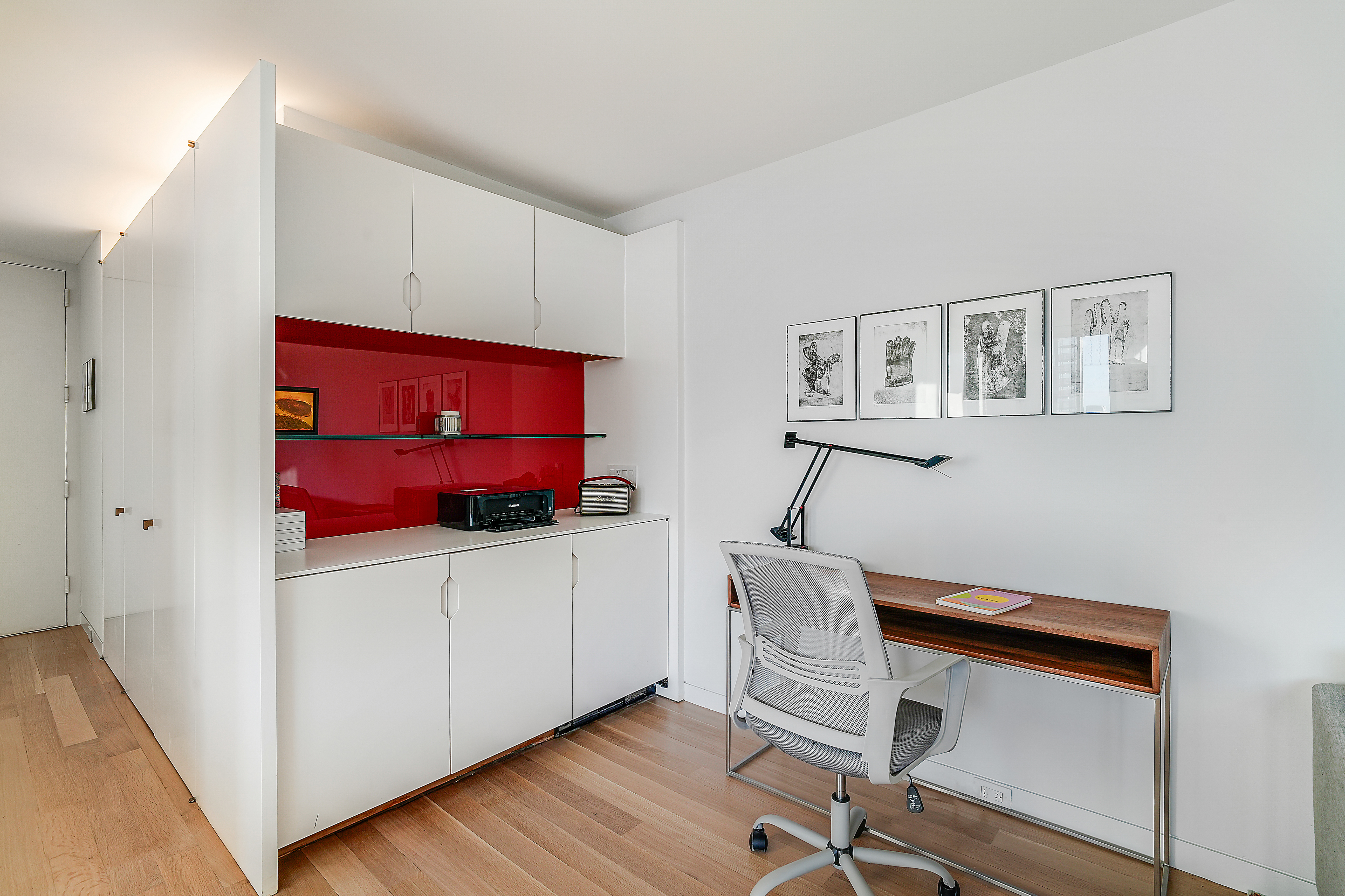 280 Park Avenue South, Unit 20C Manhattan, NY 10010 - Photo 12 of 17 a room with furniture and wooden floor