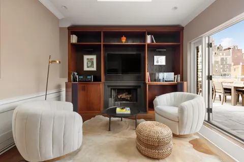 a view of a terrace with furniture