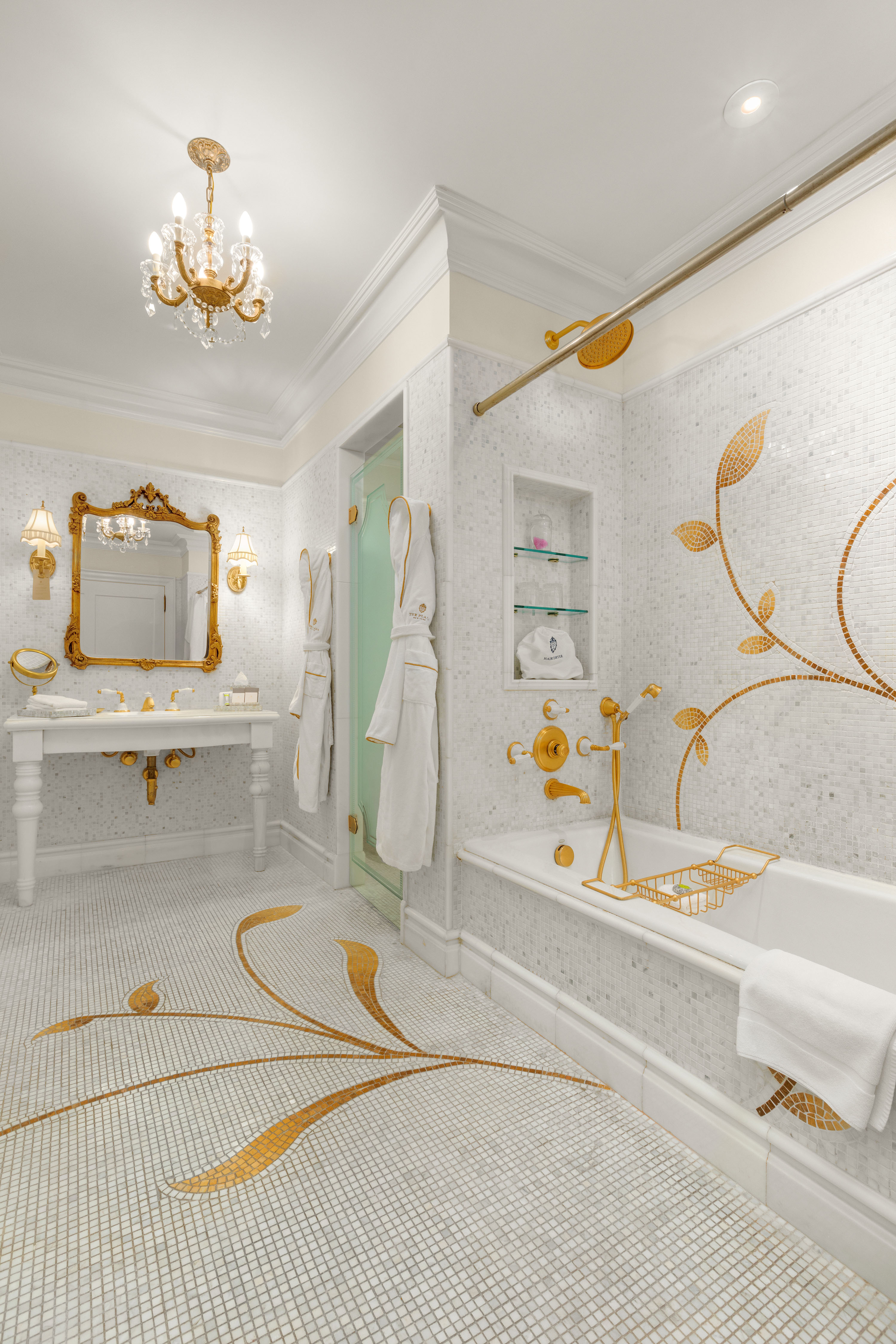 1 Central Park South, Unit 1336 Manhattan, NY 10019 - Photo 4 of 21 a bathroom with a tub sink and a mirror