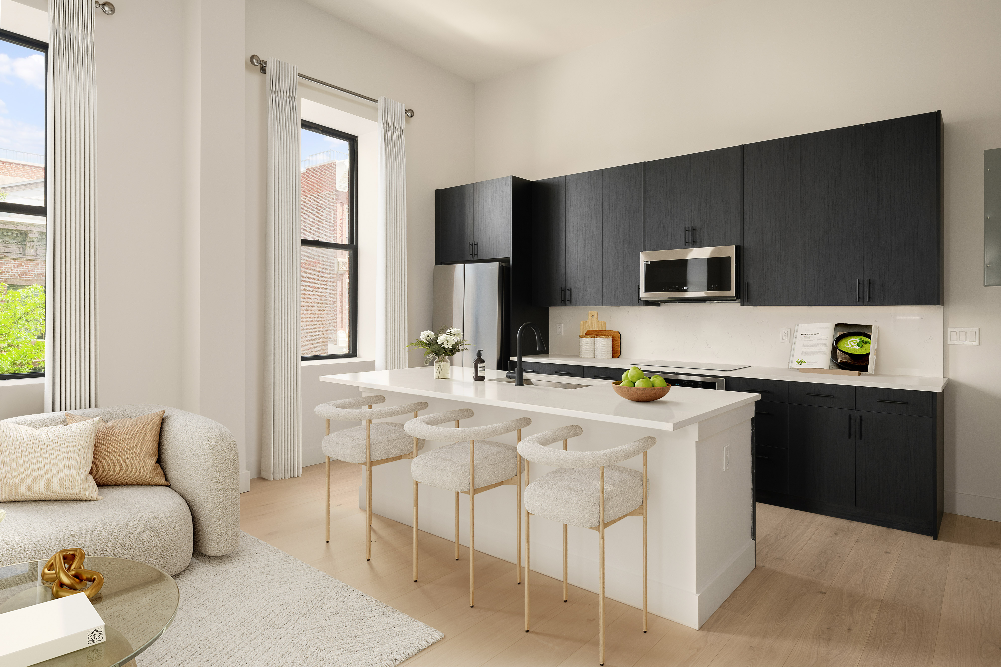 216 Grand Street, Unit LOFT 2 Brooklyn, NY 11211 - Photo 6 of 9 a kitchen with stainless steel appliances a stove a sink and a refrigerator