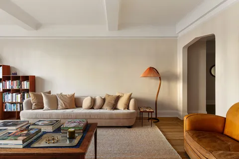 a living room with furniture and a couch