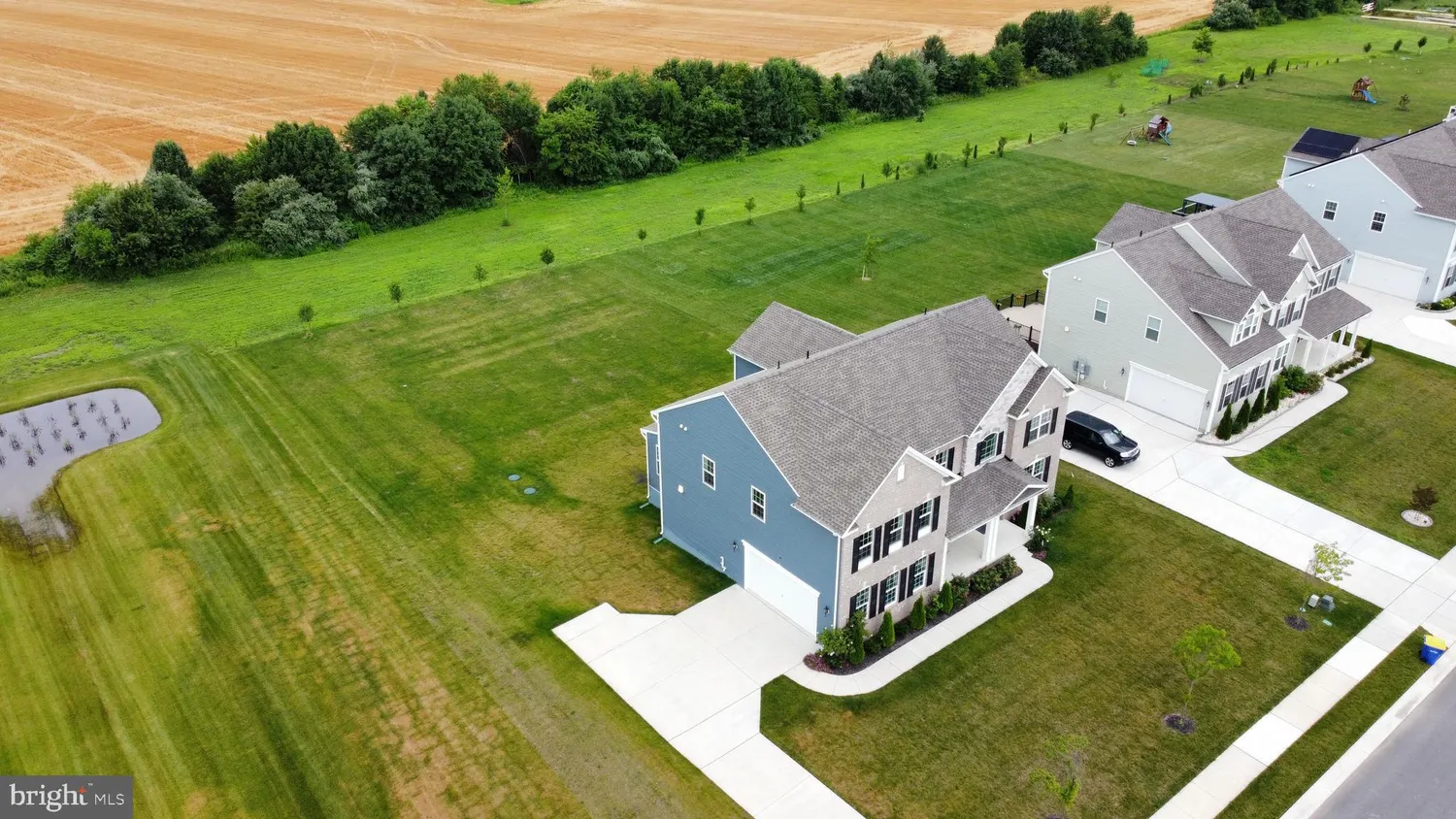 a view of a lake with a yard