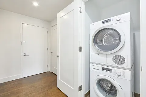 a view of washer and dryer in a utility room