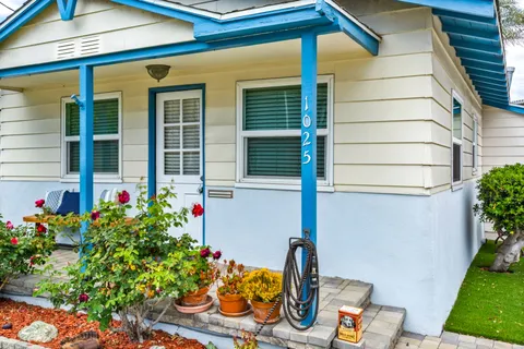 front view of a house with a patio
