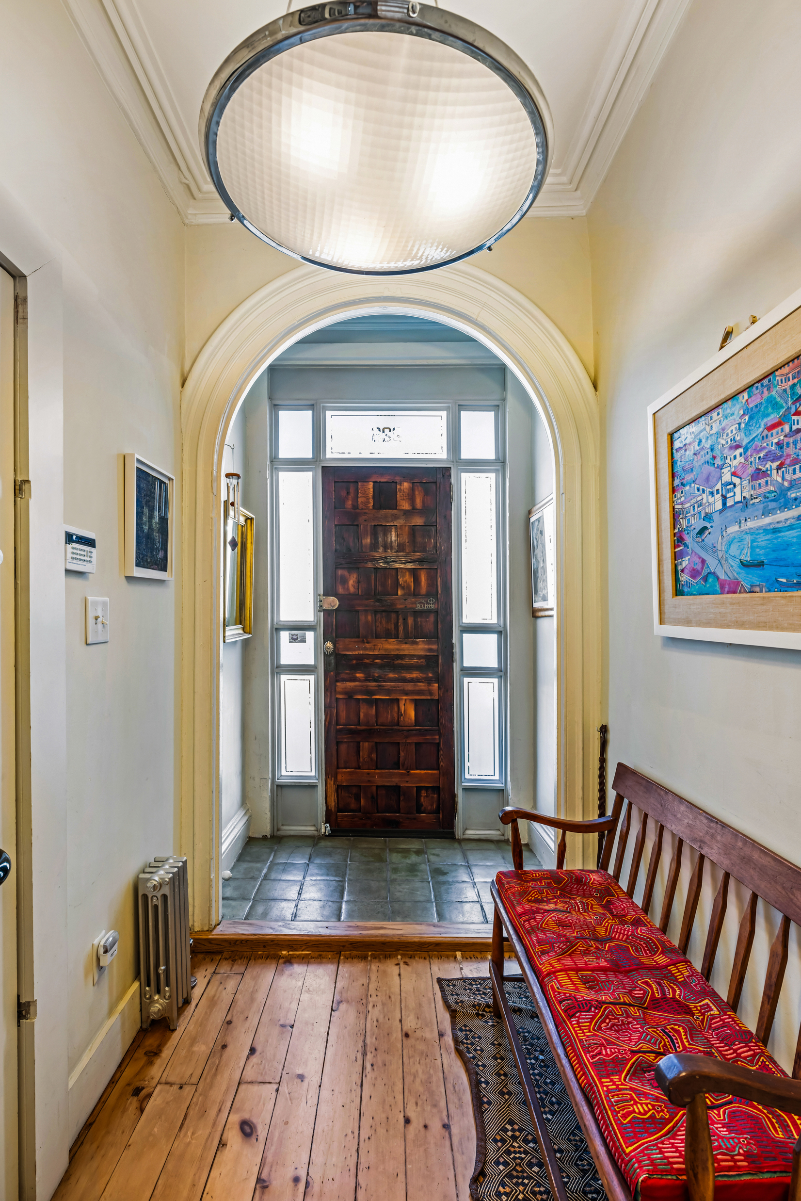 226 11th Street, Unit 2 Brooklyn, NY 11215 - Photo 17 of 19 a living room with furniture and a wooden floor