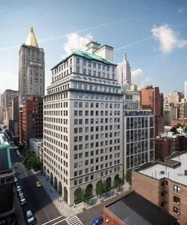 a view of a city with tall buildings