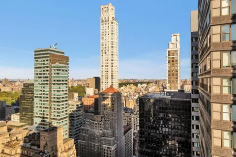 a view of a city with tall buildings