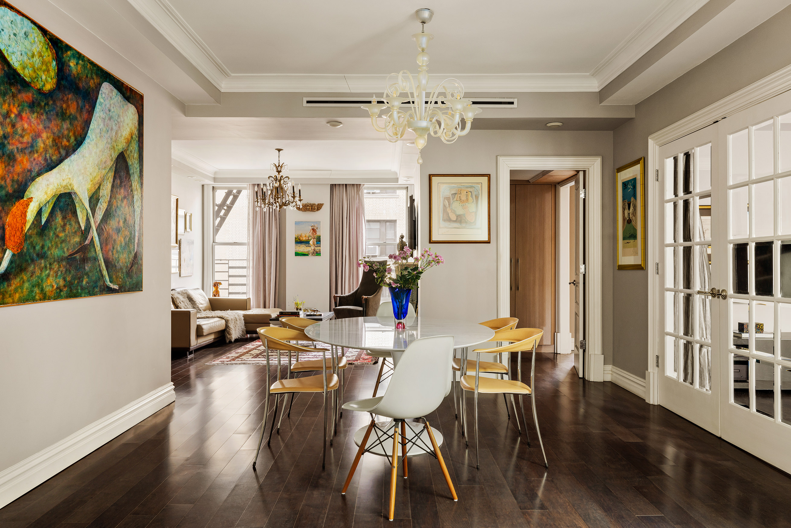 251 West 98th Street, Unit 7B Manhattan, NY 10025 - Photo 10 of 14 a view of a dining room with furniture a chandelier and wooden floor