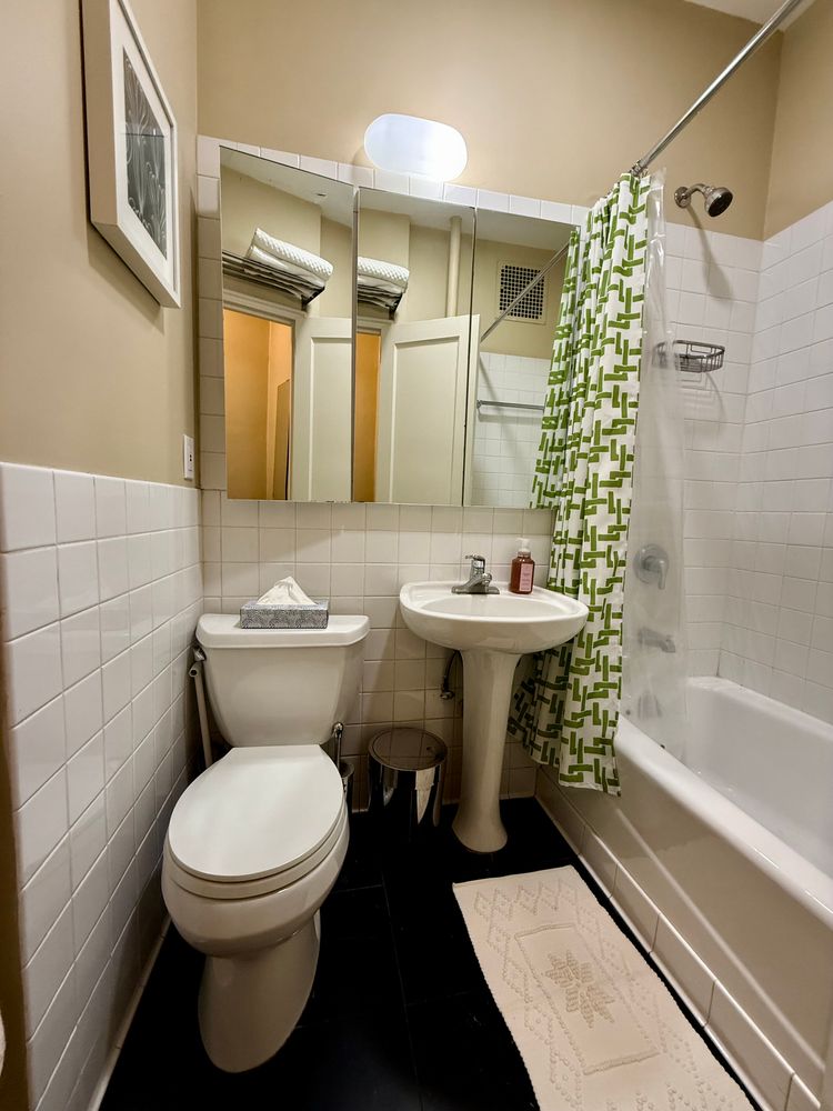 46 St Marks Place, Unit 7 Manhattan, NY 10003 - Photo 6 of 7 a bathroom with a sink toilet and shower