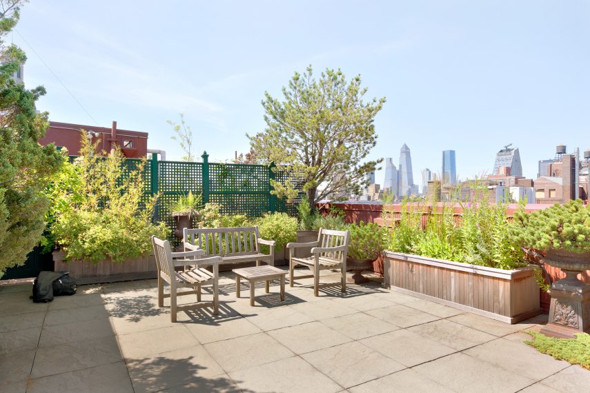 41 5th Avenue, Unit 2F Manhattan, NY 10003 - Photo 11 of 12 a view of a patio with a table and chairs and potted plants
