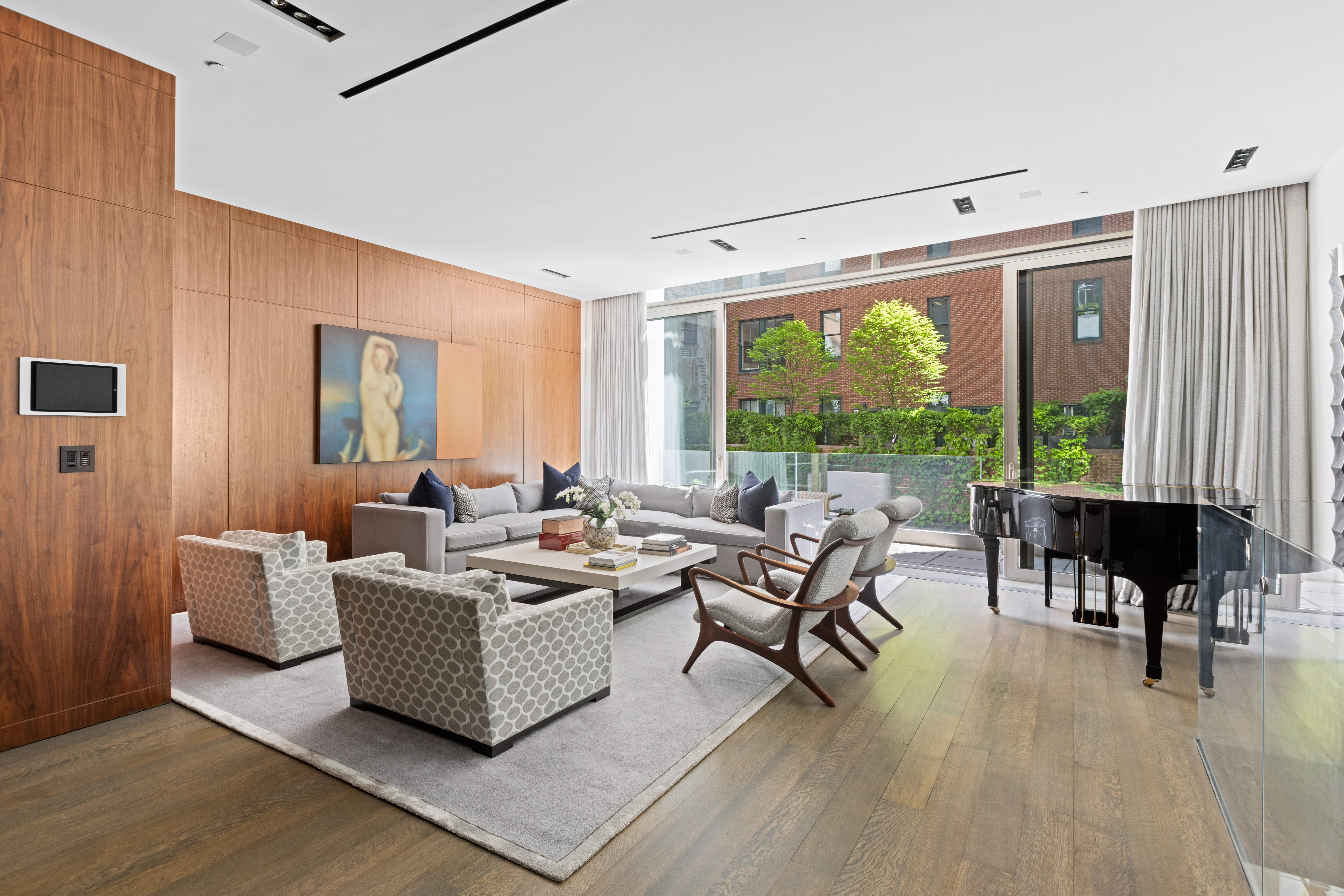 33 Vestry Street, Unit TH1 Manhattan, NY 10013 - Photo 7 of 17 a living room with furniture and a large window