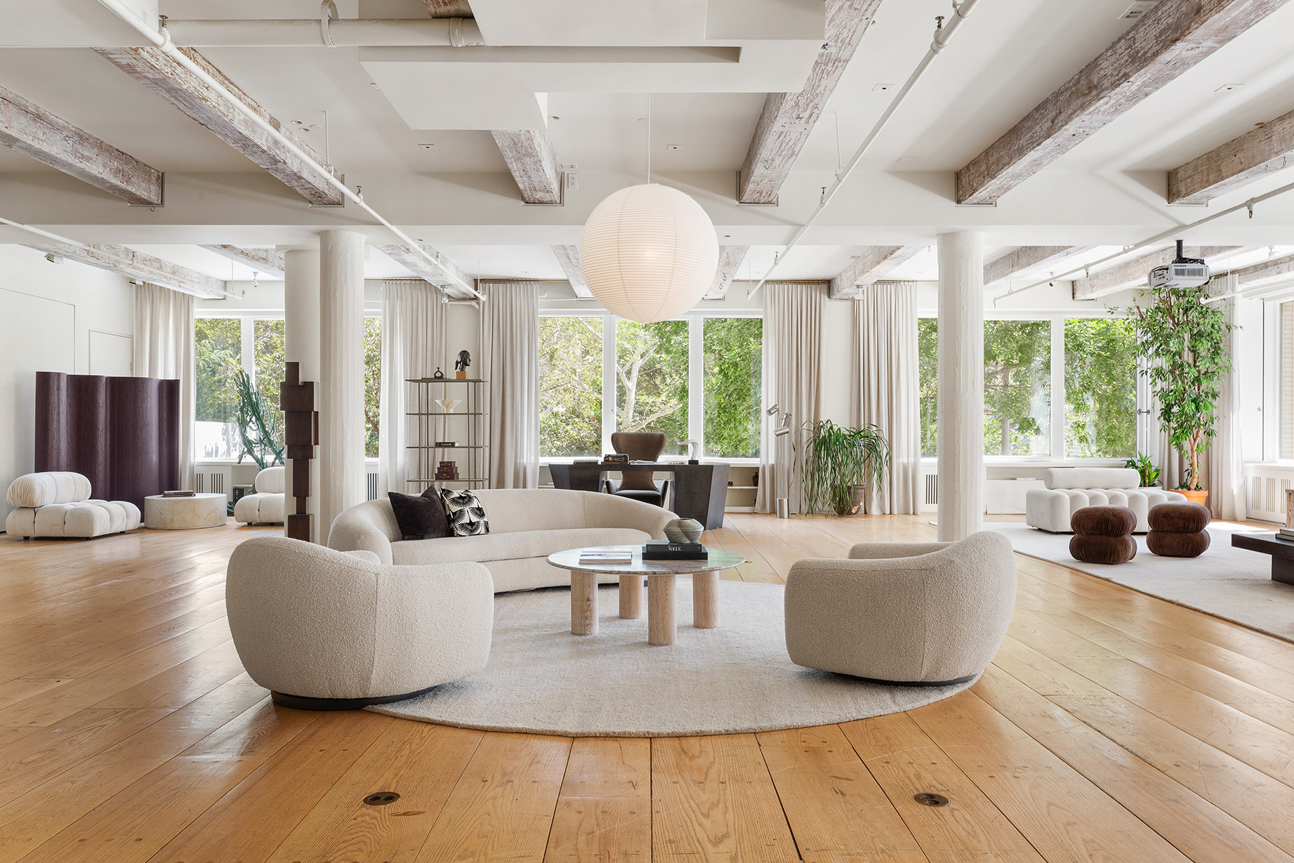 145 6th Avenue, Unit 2B Manhattan, NY 10013 - Photo 6 of 23 a living room with furniture and a large window