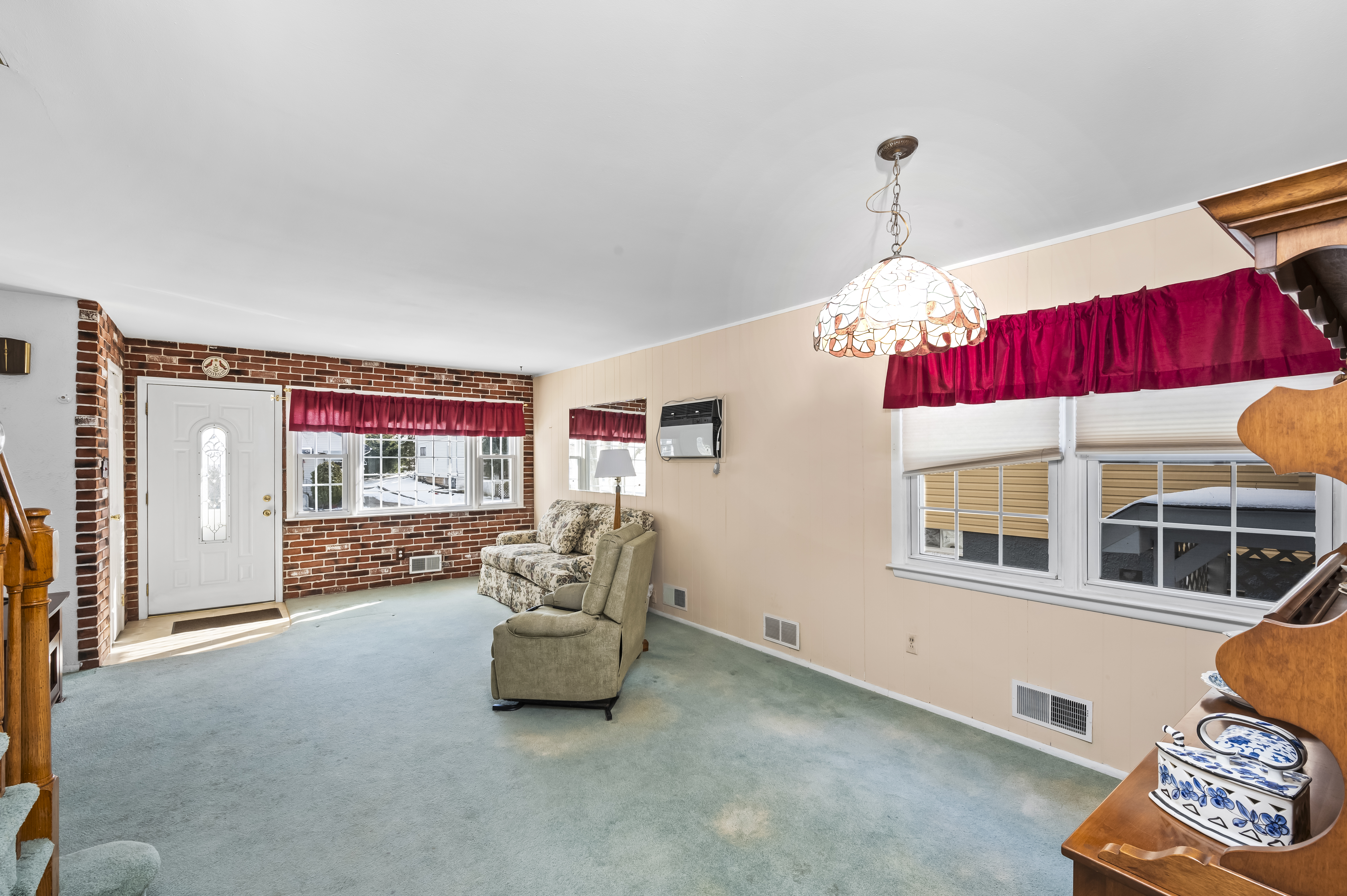 15 Area Place Staten Island, NY 10314 - Photo 8 of 27 a living room with furniture and a window