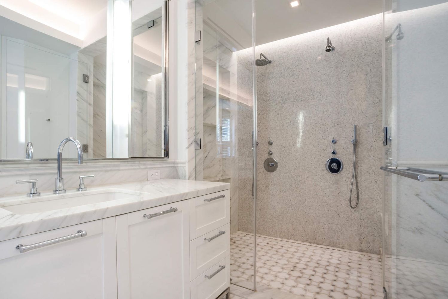 182 West 82nd Street, Unit 4E Manhattan, NY 10024 - Photo 14 of 25 a bathroom with a sink and a mirror