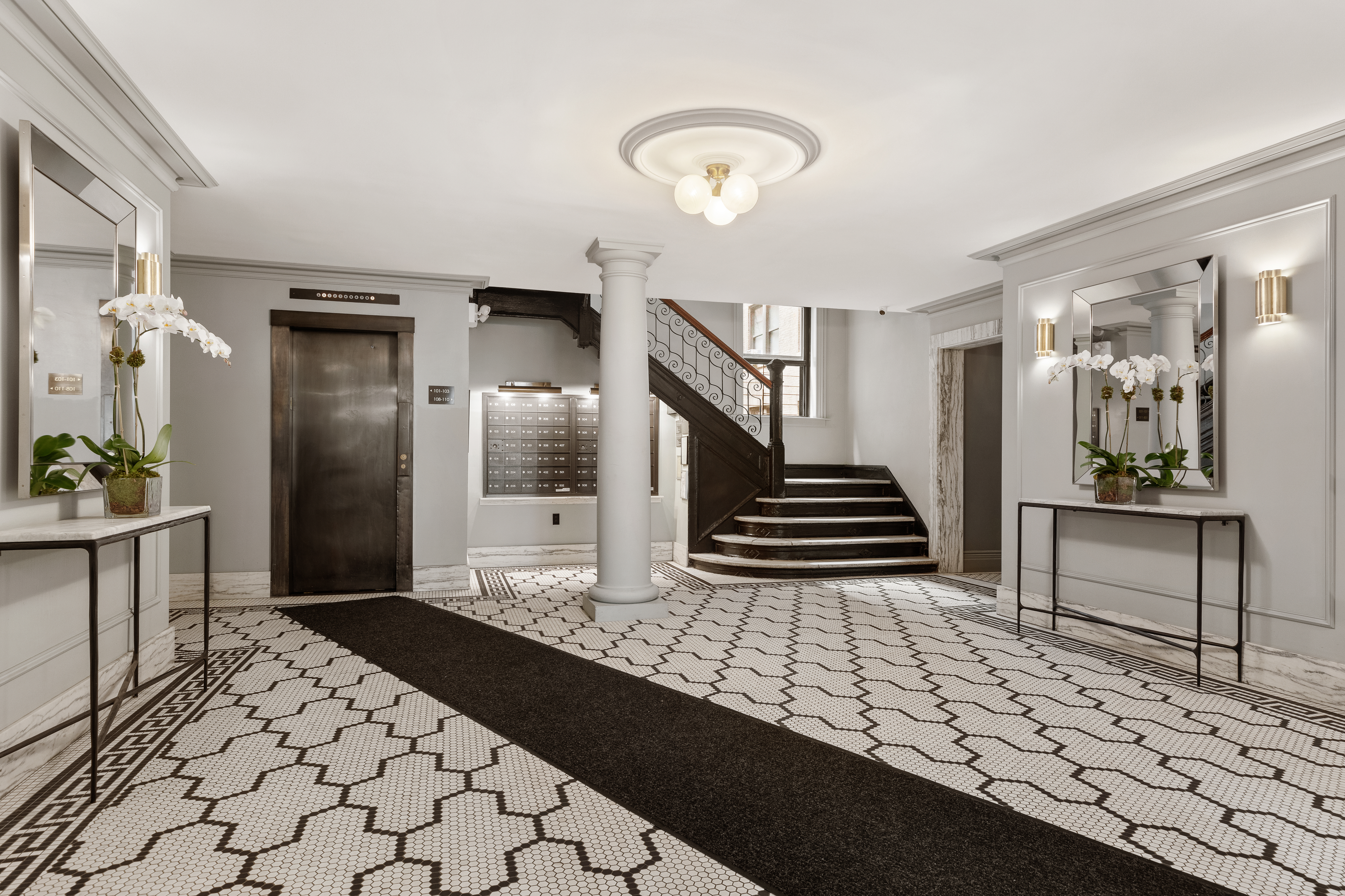 310 West 99th Street, Unit 308 Manhattan, NY 10025 - Photo 8 of 10 a view of a hallway view with staircase and a stove
