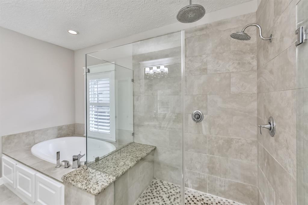 1120 Winston Street Houston, TX 77009 - Photo 23 of 29 a bathroom with a granite countertop sink and shower