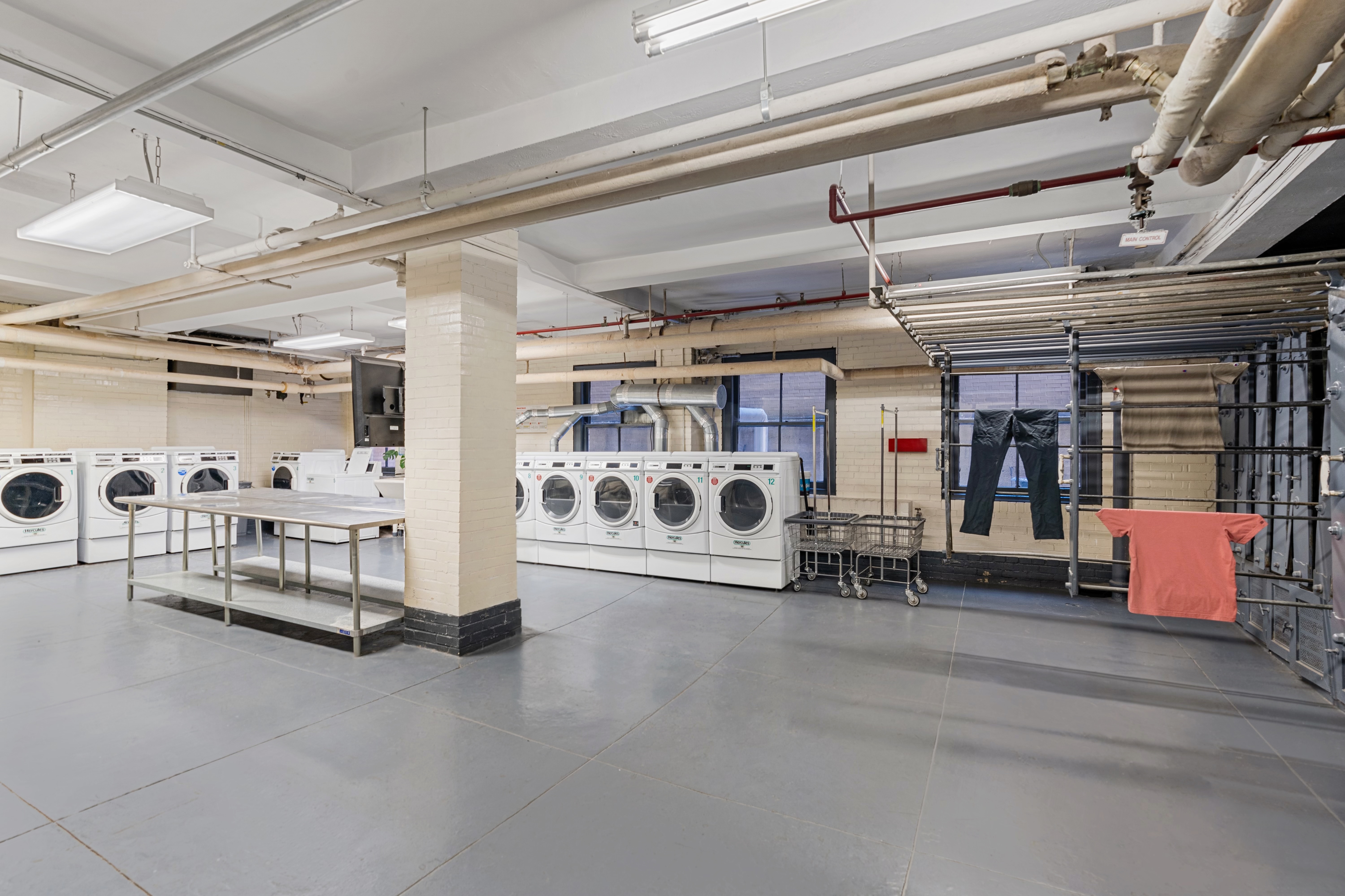 40 West 67th Street, Unit 1A Manhattan, NY 10023 - Photo 15 of 17 a view of a room with racks