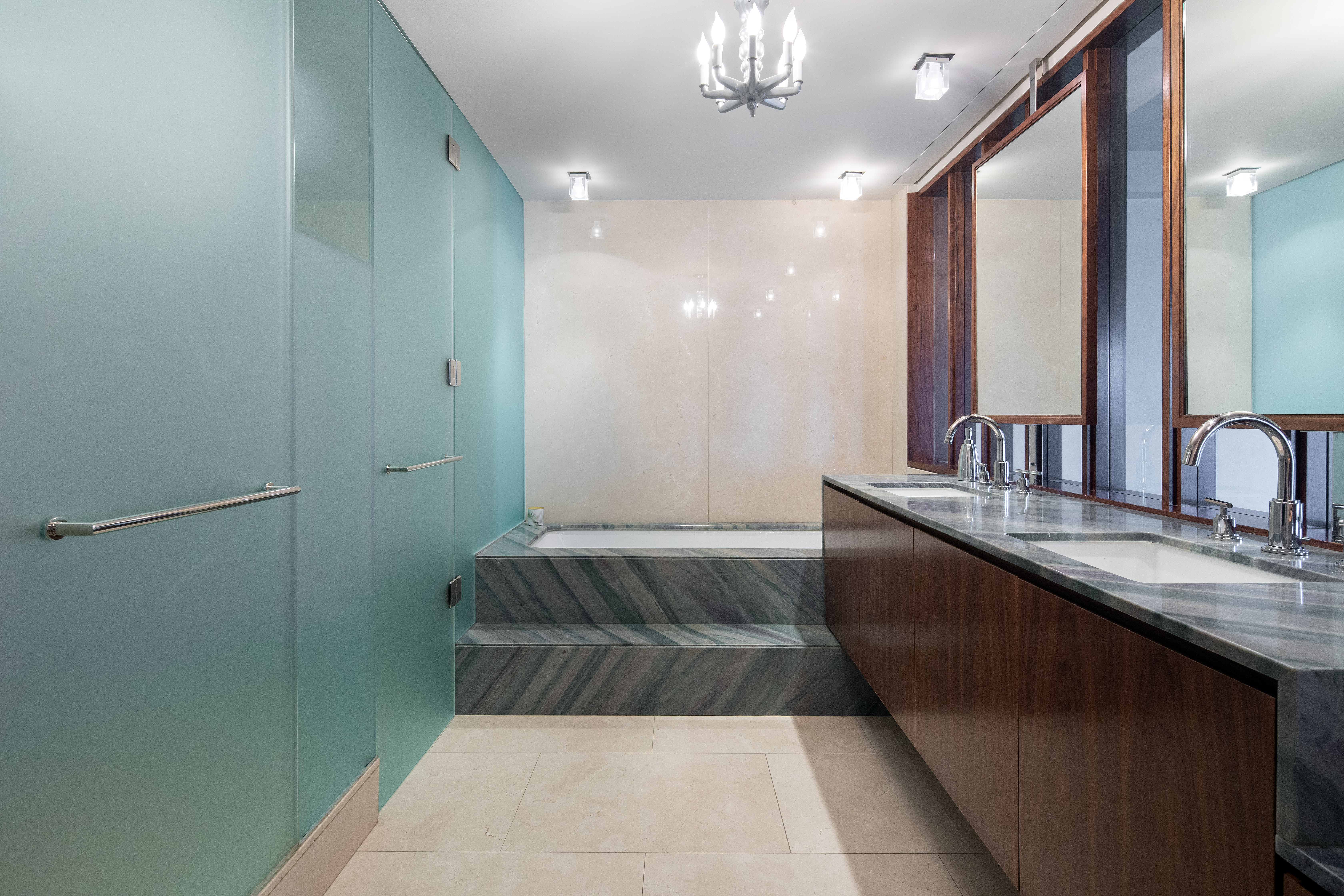 1 West 67th Street, Unit 606607 Manhattan, NY 10023 - Photo 13 of 15 a bathroom with a sink and a mirror