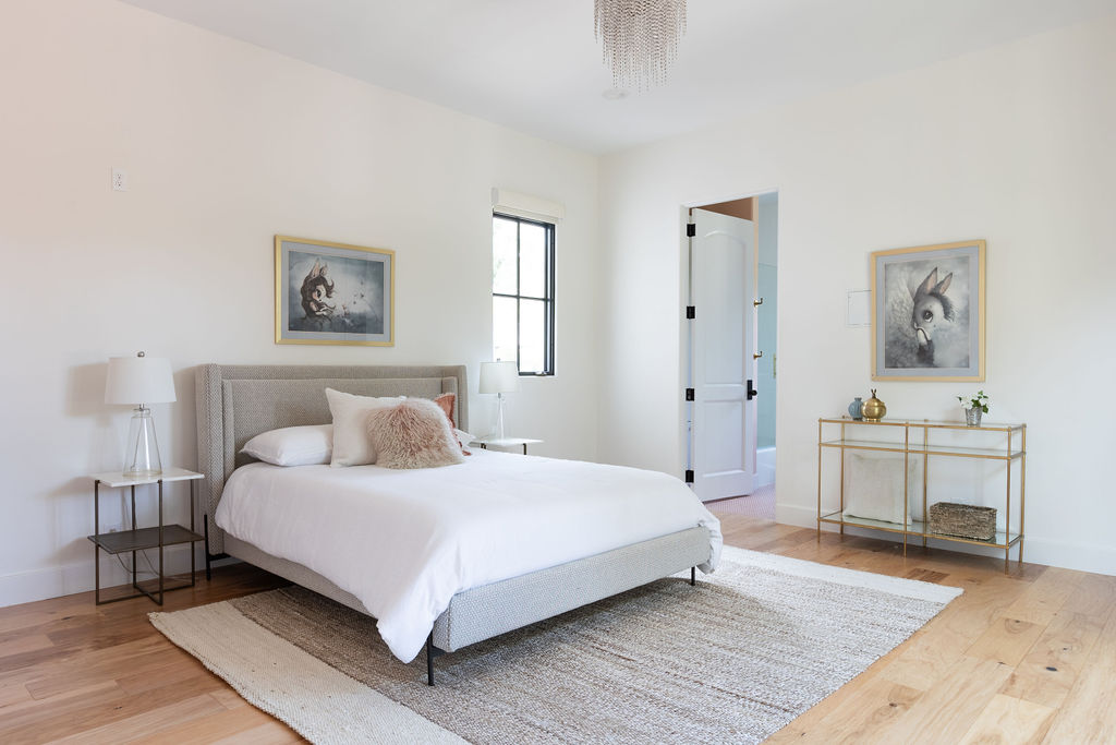 400 Inwood Road Austin, TX 78746 - Photo 40 of 43 a bedroom with a bed and a table