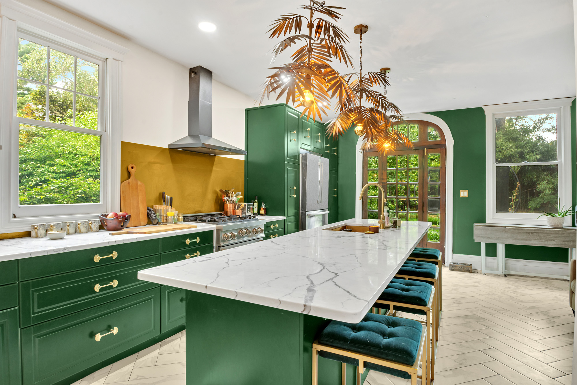117 Tysen Street Staten Island, NY 10301 - Photo 7 of 19 a view of a kitchen with a table and chairs